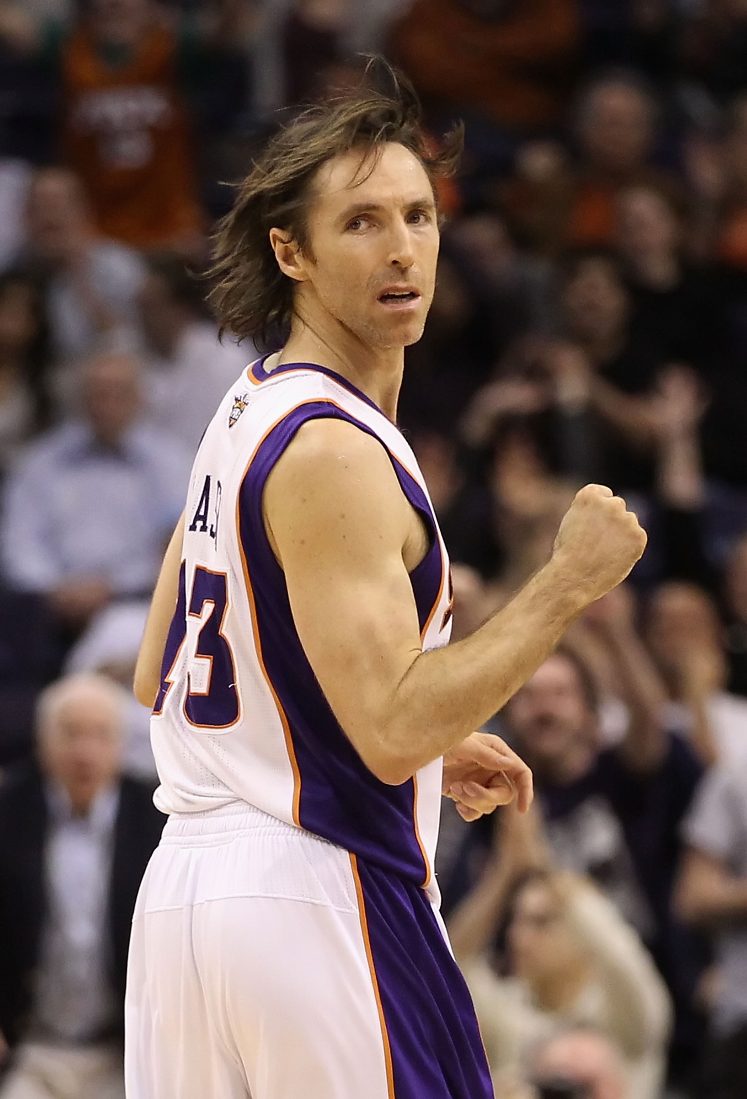 PHOENIX, AZ - JANUARY 14:  Steve Nash #13 of the Phoenix Suns pumps his fist after hitting a three point shot against the Portland Trail Blazers during the NBA game at US Airways Center on January 14, 2011 in Phoenix, Arizona.  The Suns defeated the 115-1