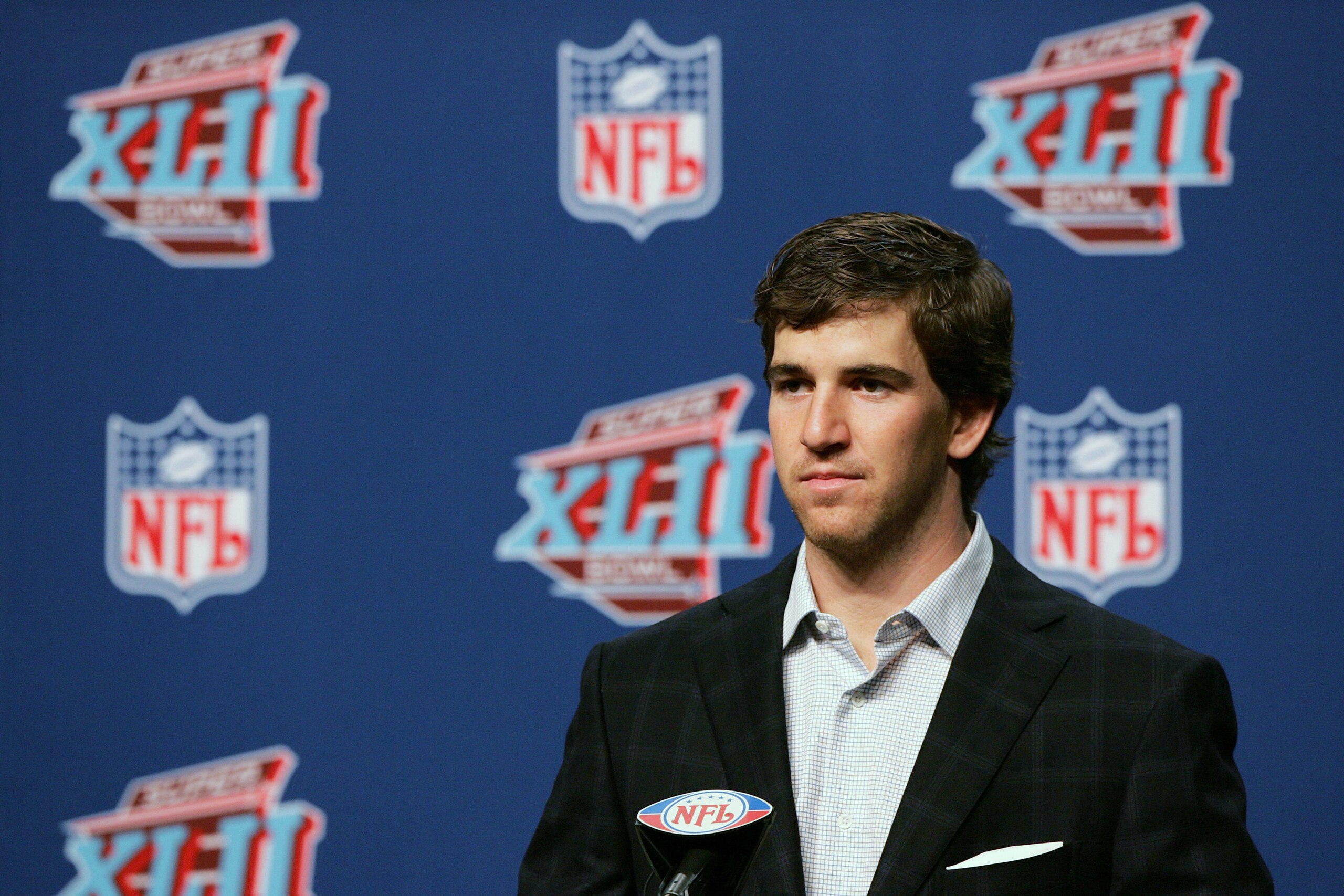 PHOENIX - FEBRUARY 04:  New York Giants Super Bowl MVP quarterback Eli Manning addresses the media during a press conference at the Phoenix Convention Center on February 4, 2007 in Phoenix, Arizona.  (Photo by Gene Lower/Getty Images)