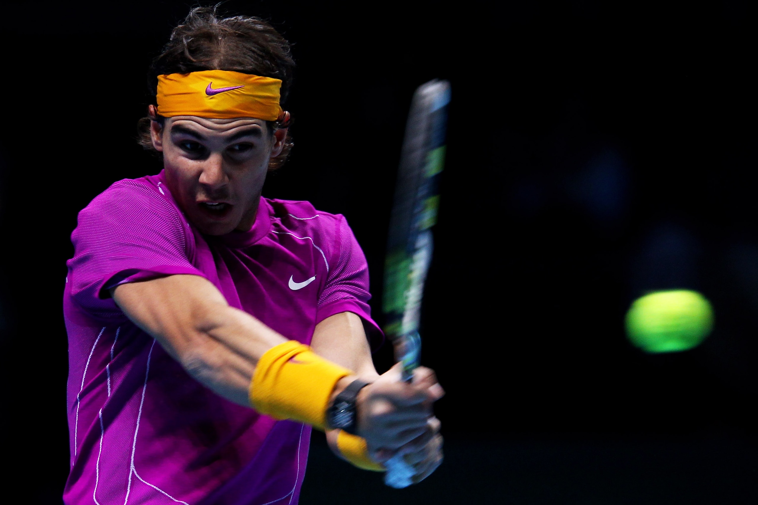 LONDON, ENGLAND - NOVEMBER 28:  Rafael Nadal of Spain plays a forehand during his men's final match against Roger Federer of Switzerland during the ATP World Tour Finals at O2 Arena on November 28, 2010 in London, England.  (Photo by Clive Brunskill/Getty