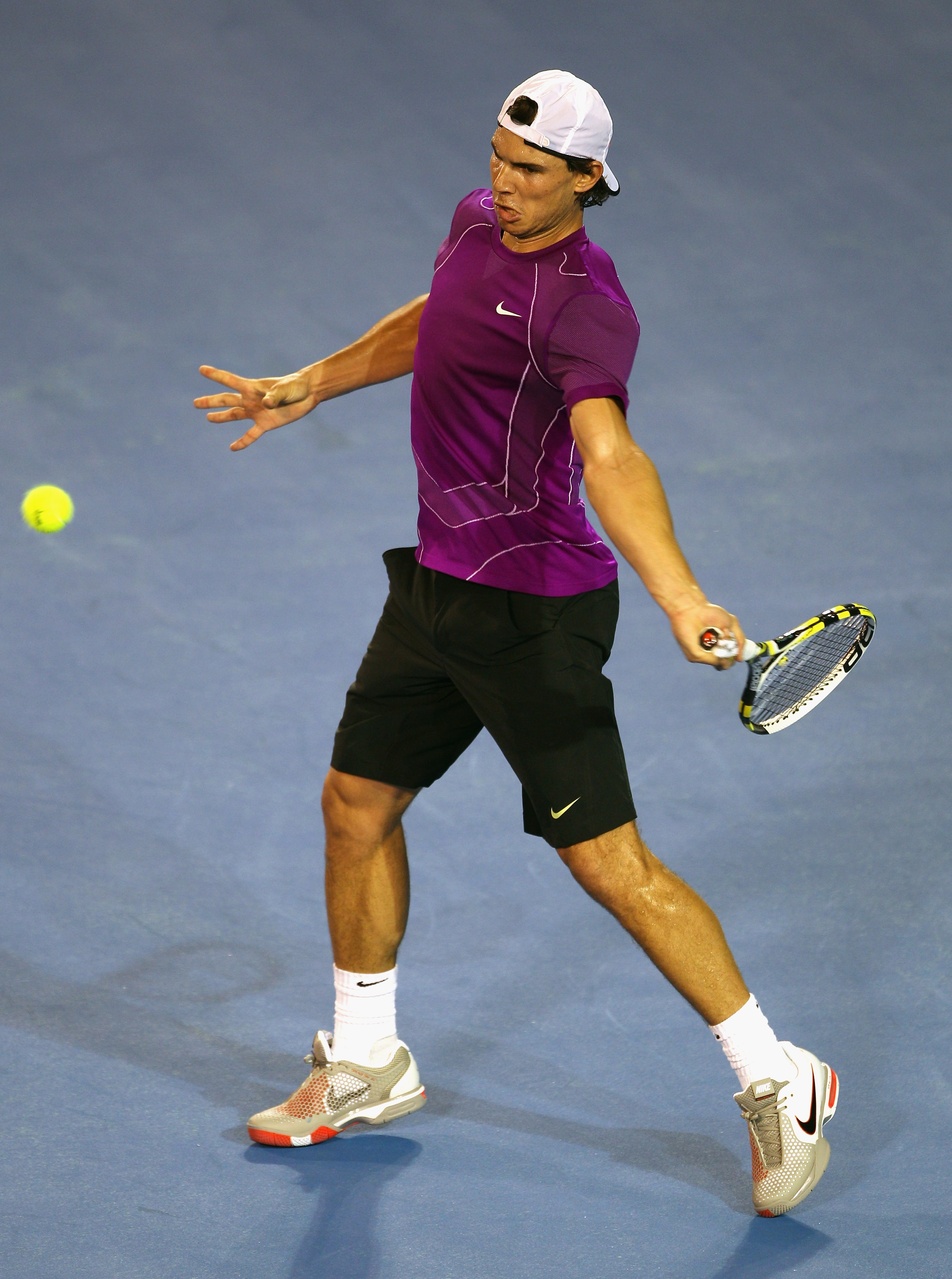 MELBOURNE, AUSTRALIA - JANUARY 12:  Rafael Nadal of Spain hits a forehand during a practice session ahead of the 2011 Australian Open at Melbourne Park on January 12, 2011 in Melbourne, Australia.  (Photo by Mark Dadswell/Getty Images)