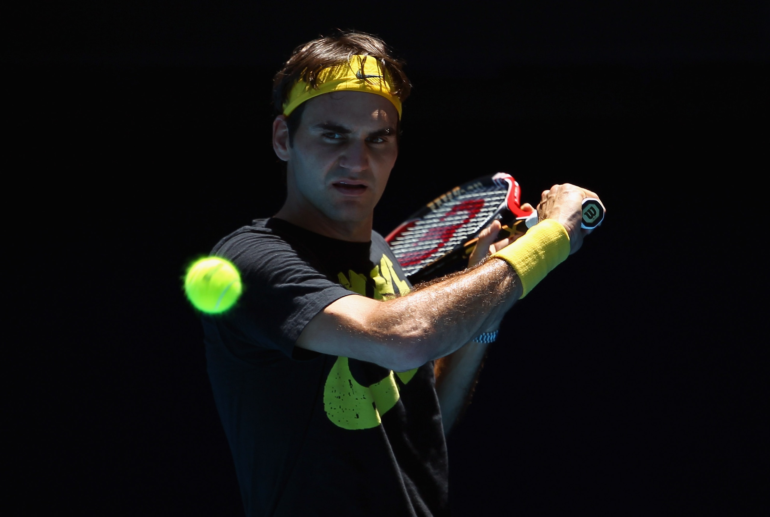 MELBOURNE, AUSTRALIA - JANUARY 15:  Roger Federer of Switzerland in action during a practice session ahead of the 2011 Australian Open at Melbourne Park on January 15, 2011 in Melbourne, Australia.  (Photo by Julian Finney/Getty Images)