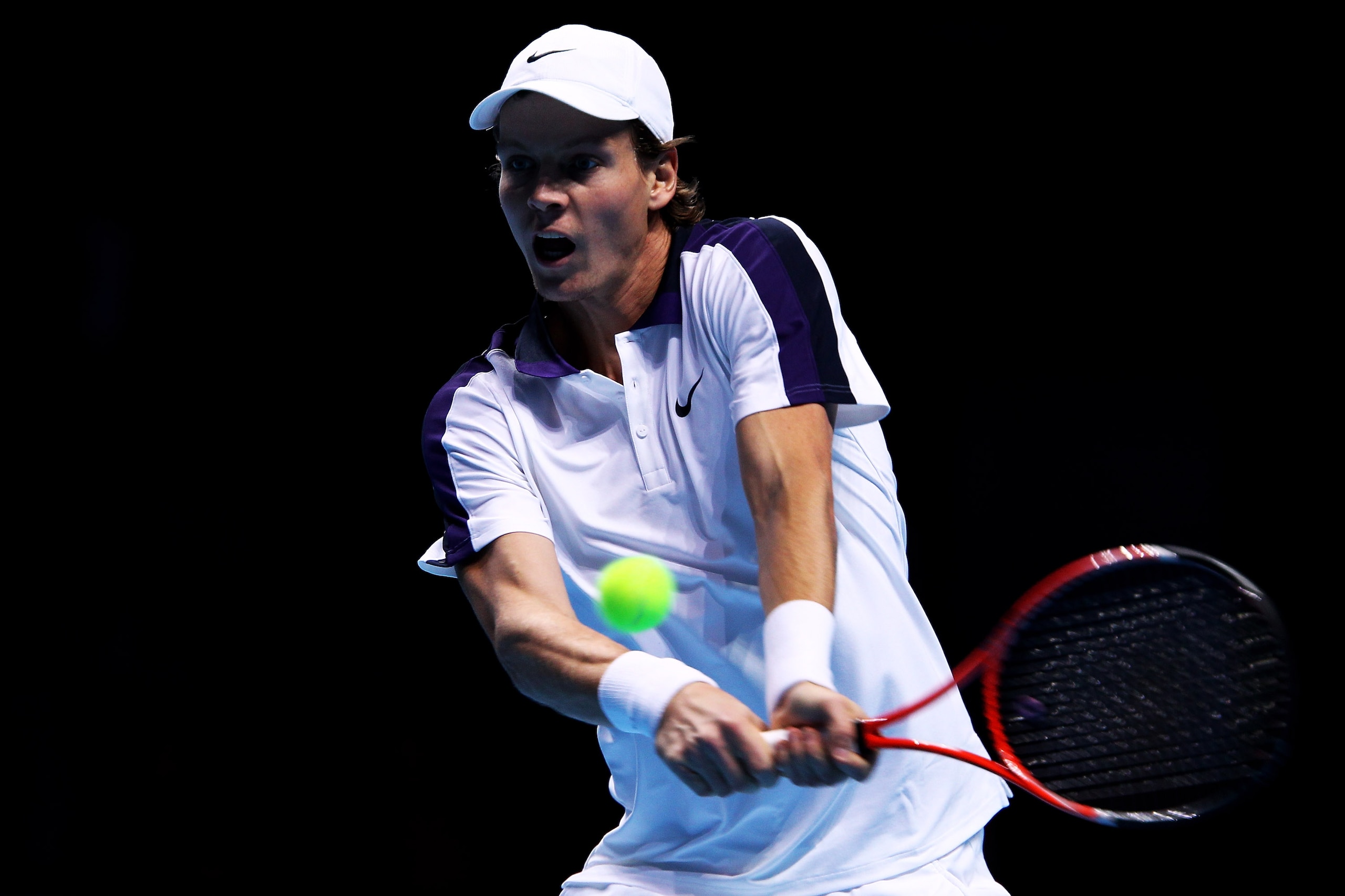 LONDON, ENGLAND - NOVEMBER 26:  Tomas Berdych of Czech Republic returns the ball during his men's singles match against Rafael Nadal of Spain during the ATP World Tour Finals at O2 Arena on November 26, 2010 in London, England.  (Photo by Clive Brunskill/