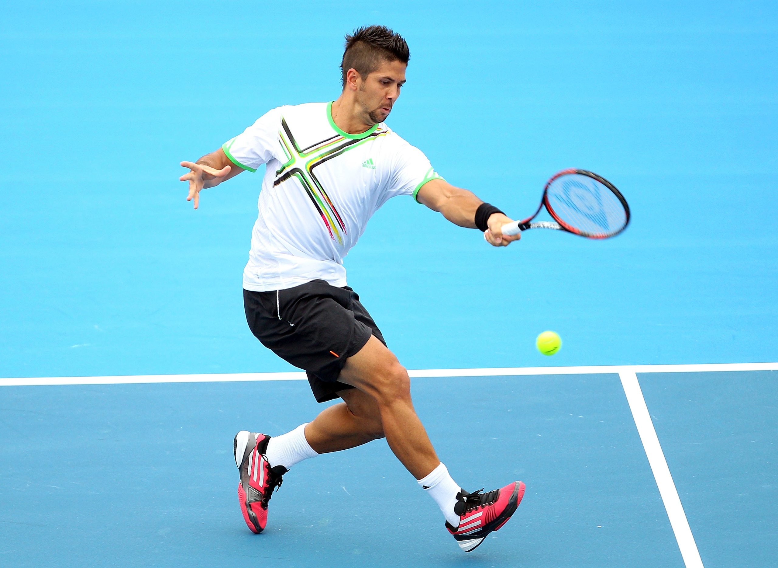 MELBOURNE, AUSTRALIA - JANUARY 12:  Fernando Verdasco of Spain plays a forehand during his match against Gael Monfils of France during day one of the AAMI Classic at Kooyong on January 12, 2011 in Melbourne, Australia.  (Photo by Lucas Dawson/Getty Images