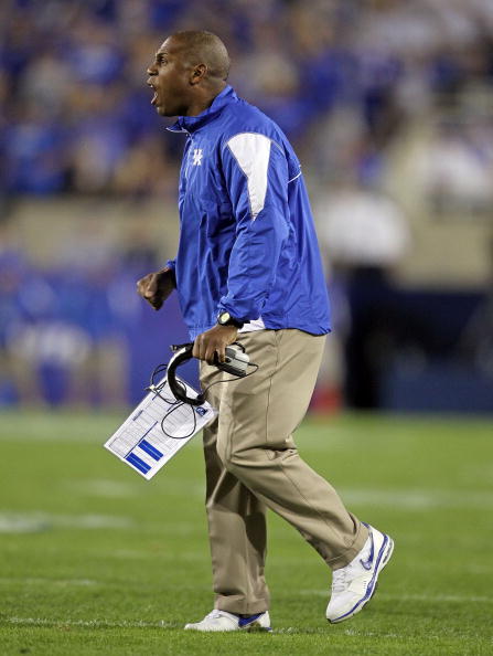 LEXINGTON, KY - OCTOBER 09: Joker Phillips the Head Coach of the Kentucky Wildcats gives instructions to his team during the SEC game against  the Auburn Tigers  at Commonwealth Stadium on October 9, 2010 in Lexington, Kentucky.  (Photo by Andy Lyons/Gett