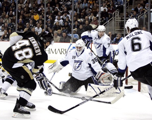 PITTSBURGH, PA - JANUARY 05:  Tyler Kennedy #48 of the Pittsburgh Penguins shoots and scores past Dwayne Roloson #35 of the Tampa Bay Lightning on January 5, 2011 at Consol Energy Center in Pittsburgh, Pennsylvania.  (Photo by Justin K. Aller/Getty Images