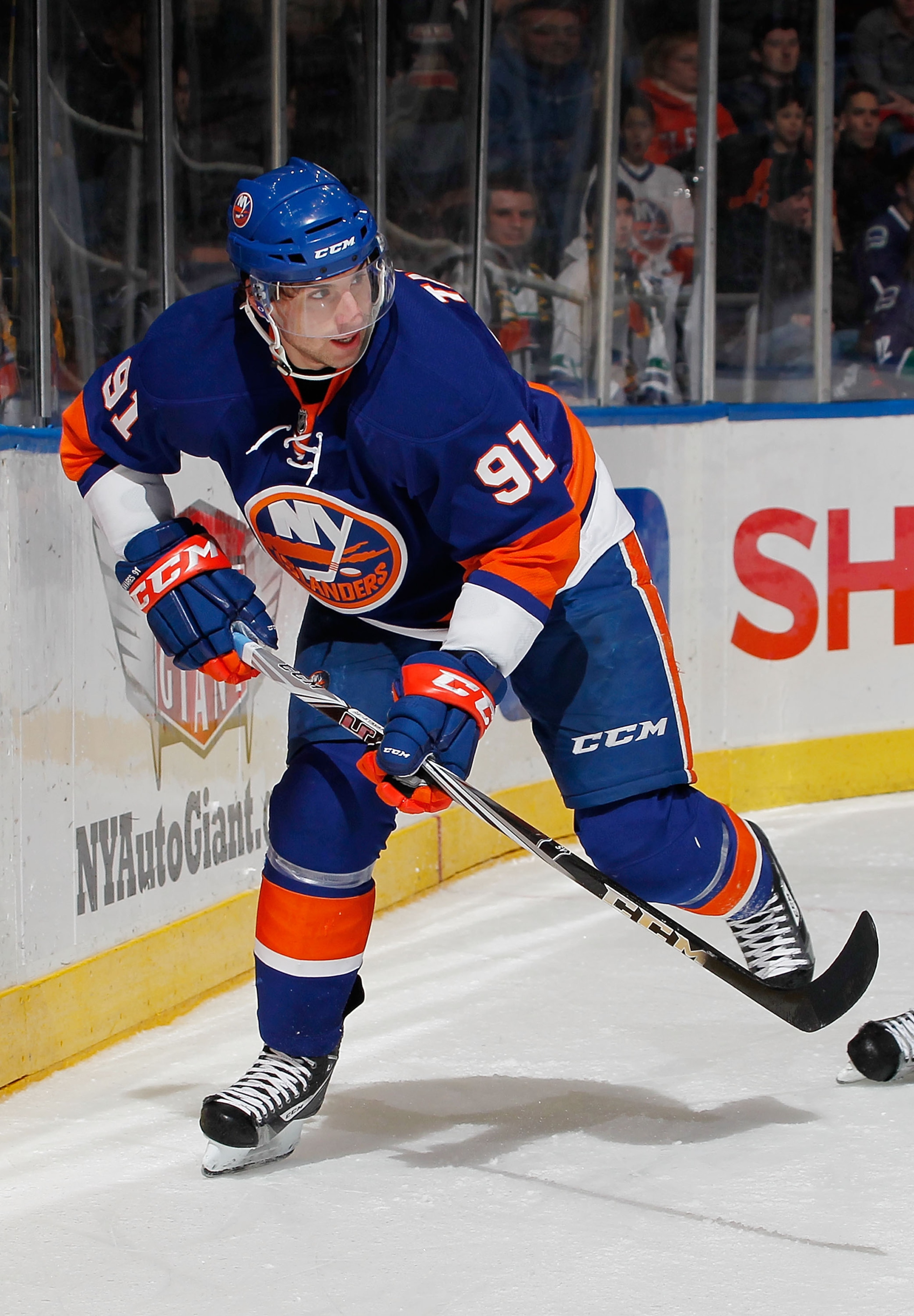 UNIONDALE, NY - JANUARY 11: John Tavares #91 of the New York Islanders skates during an NHL game against the Vancouver Canucks at the Nassau Coliseum on January 11, 2011 in Uniondale, New York. (Photo by Paul Bereswill/Getty Images) UNIONDALE, NY - JANUARY 11: John Tavares #91 of the New York Islanders skates during an NHL game against the Vancouver Canucks at the Nassau Coliseum on January 11, 2011 in Uniondale, New York. (Photo by Paul Bereswill/Getty Images)