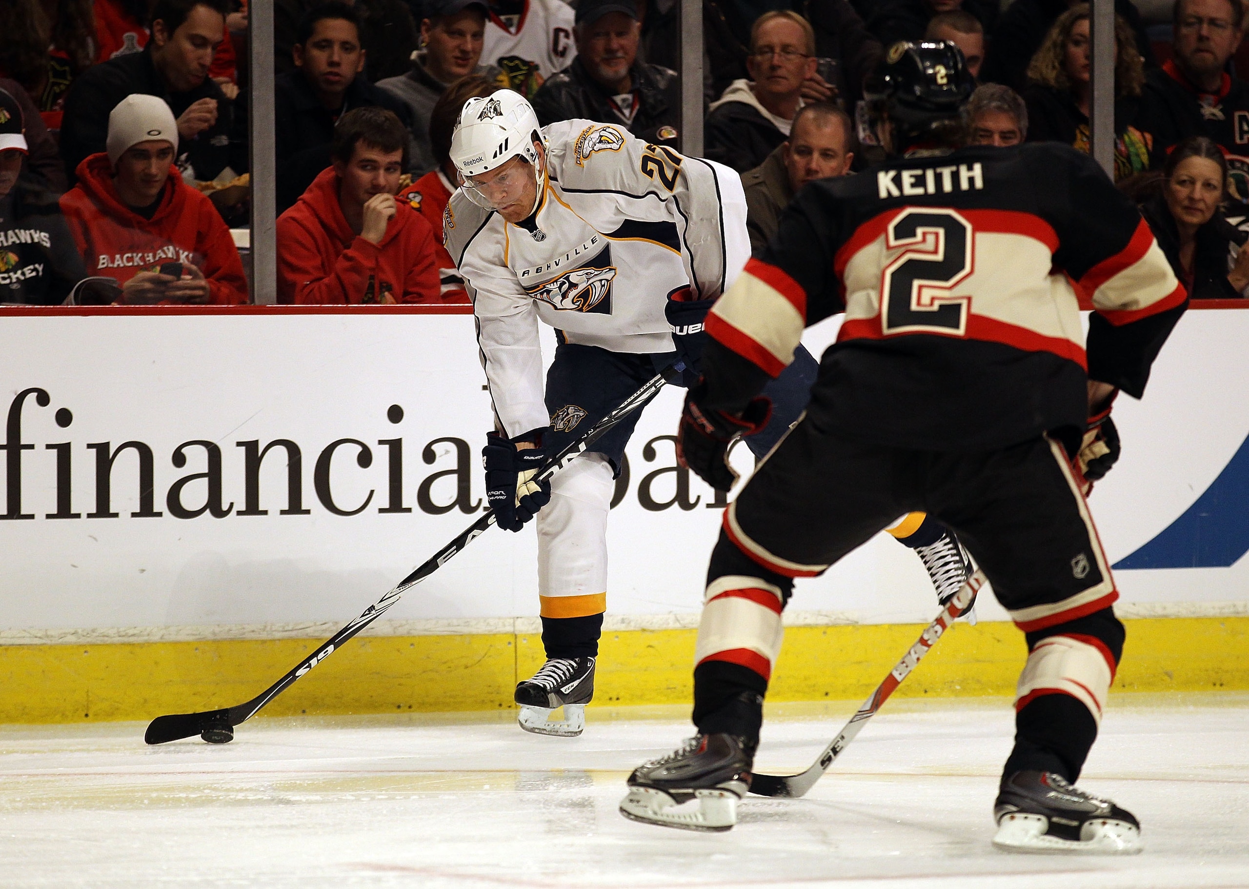 CHICAGO, IL - DECEMBER 22: Patric Hornqvist #27 of the Nashville Predators passes the puck against Duncan Keith #2 of the Chicago Blackhawks at the United Center on December 22, 2010 in Chicago, Illinois. The Blackhawks defeated the Predators 4-1. (Photo CHICAGO, IL - DECEMBER 22: Patric Hornqvist #27 of the Nashville Predators passes the puck against Duncan Keith #2 of the Chicago Blackhawks at the United Center on December 22, 2010 in Chicago, Illinois. The Blackhawks defeated the Predators 4-1. (Photo