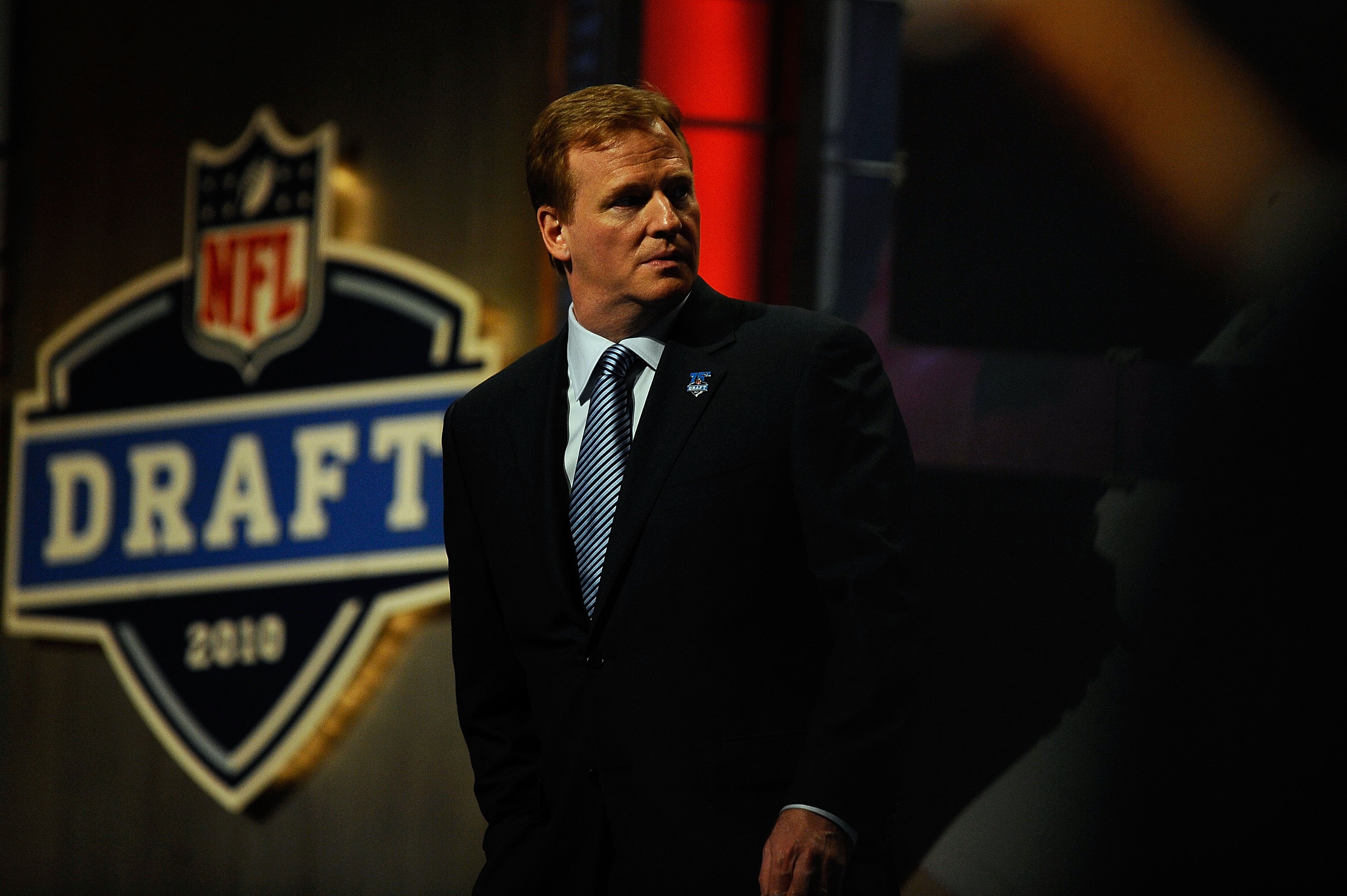 NEW YORK - APRIL 22:  NFL Commissioner Roger Goodell looks on as he stands on stage during the first round of the 2010 NFL Draft at Radio City Music Hall on April 22, 2010 in New York City.  (Photo by Jeff Zelevansky/Getty Images)