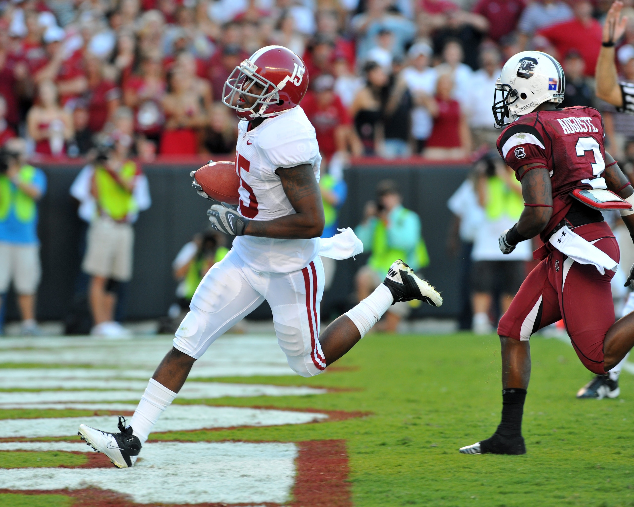 COLUMBIA, SC - OCTOBER 9: Wide receiver Darius Hanks #15 of the Alabama Crimson Tide runs to the end zone with a 51-yard touchdown pass against the South Carolina Gamecocks October 9, 2010 at Williams-Brice Stadium in Columbia, South Carolina.  (Photo by