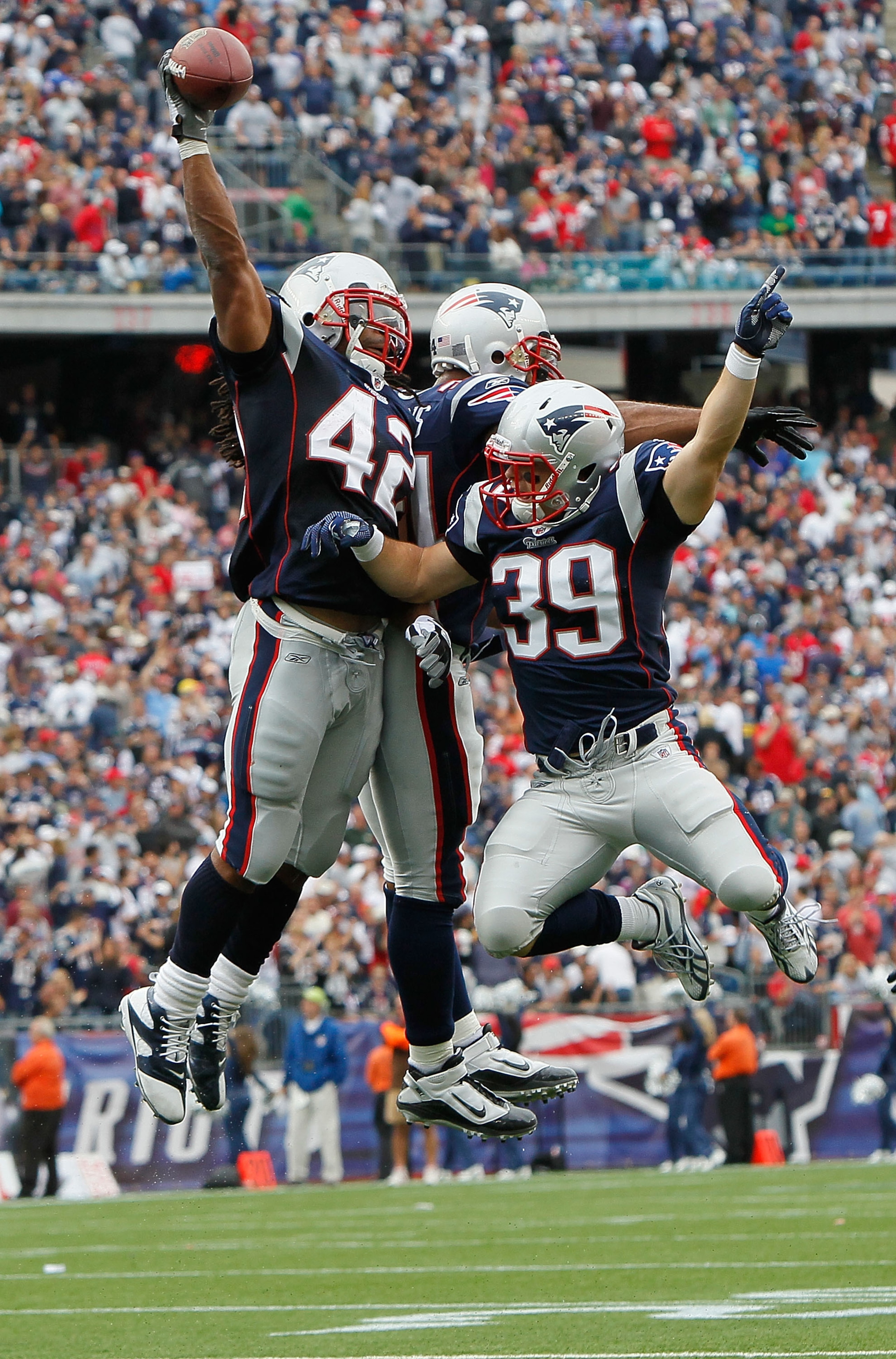FOXBORO, MA - SEPTEMBER 26: BenJarvus Green-Elllis #42 of the New England Patriots celebrates his touchdown with teammates Sammy Morris #34 and Danny Woodhead #39 in the second half against the Buffalo Bills at Gillette Stadium in the second half on Septe