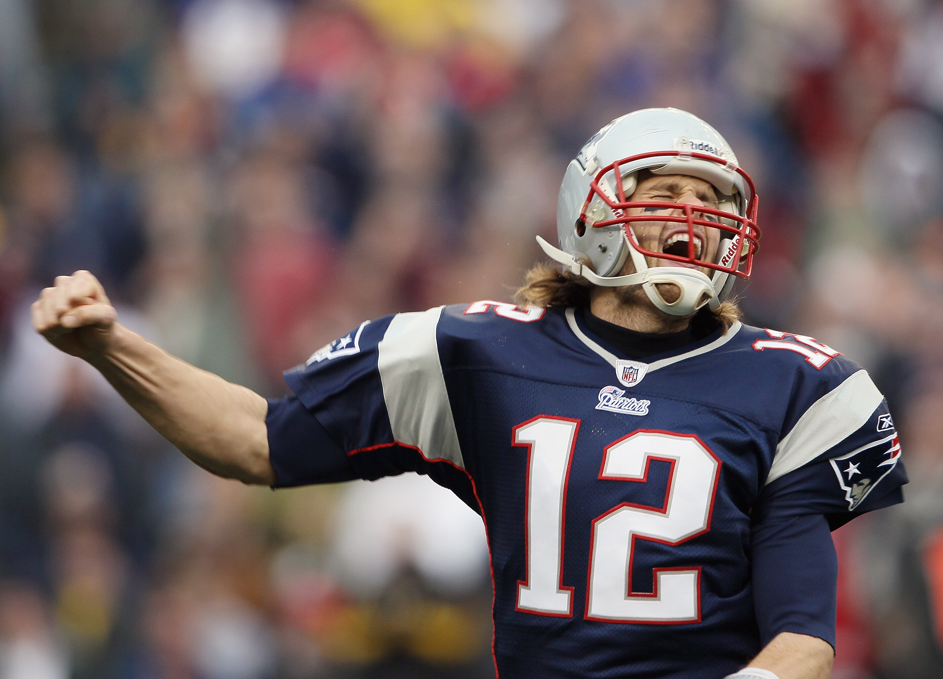 New England Patriots Tom Brady and Wes Welker react after Welker scores on  a 6 yard touchdown catch against the New York Jets in week 2 of the NFL  season at New