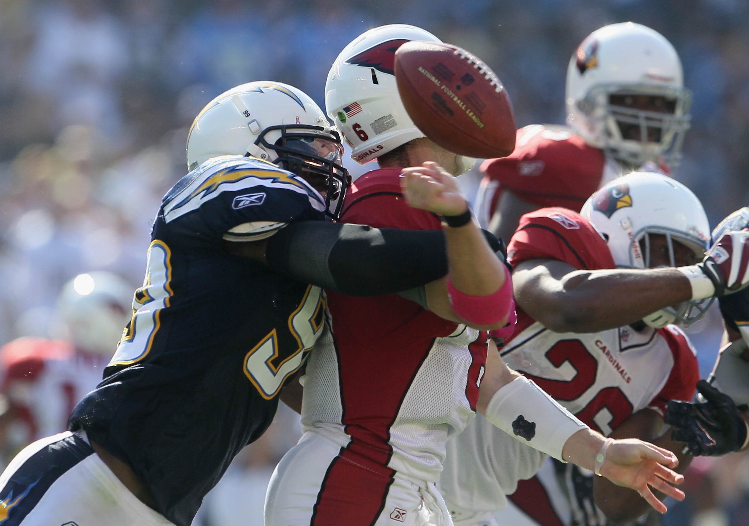 SAN DIEGO - OCTOBER 03:  Kevin Burnett #99 of the San Diego Chargers sacks quarterback Max Hall #6 of the Arizona Cardinals resulting in a fumble during the third quarter at Qualcomm Stadium on October 3, 2010 in San Diego, California. The Chargers defeat