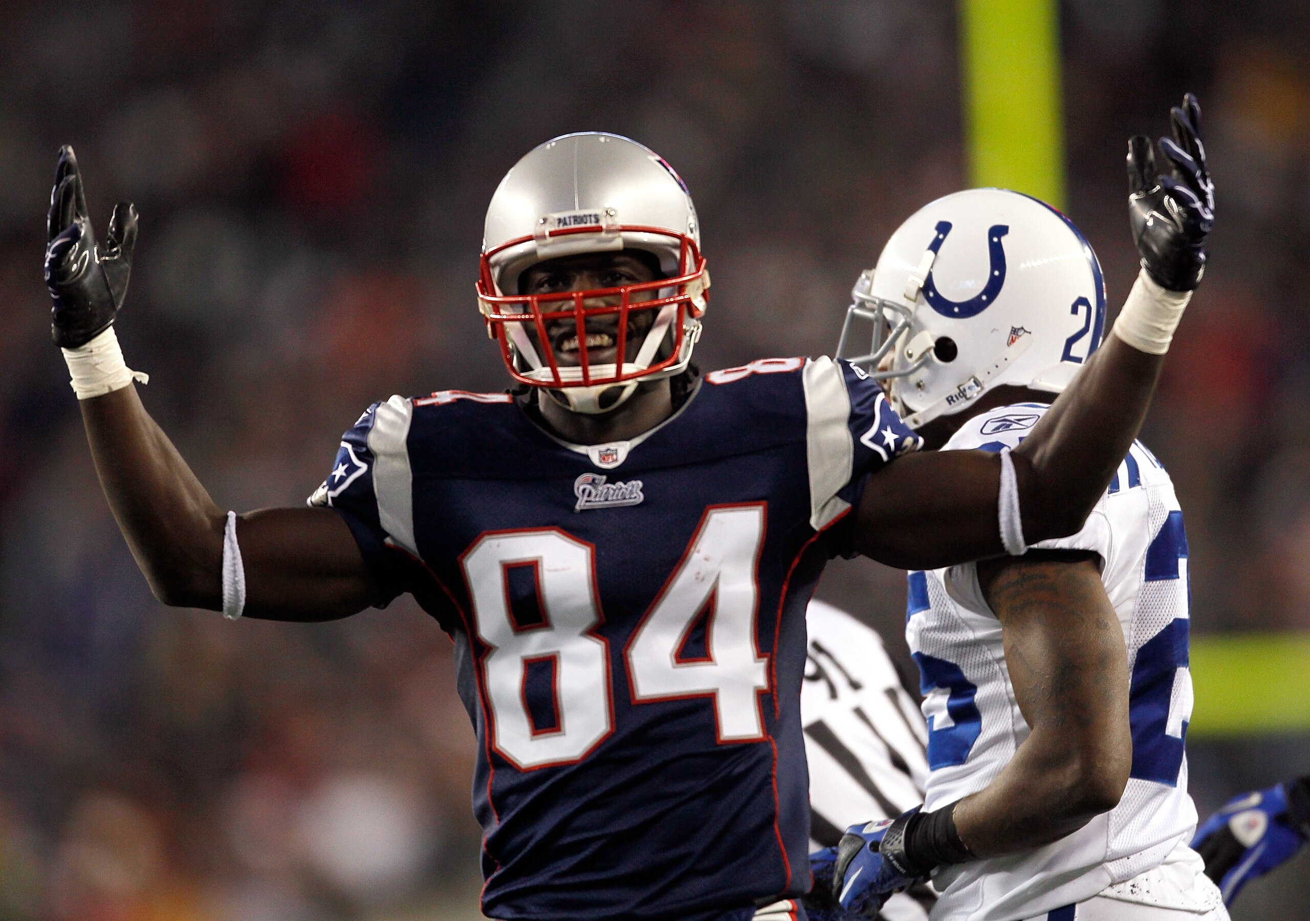 FOXBORO, MA - NOVEMBER 21: Deion Branch #84 of the New England Patriots reacts after teammate in the second half against the Indianapolis Colts at Gillette Stadium on November 21, 2010 in Foxboro, Massachusetts. (Photo by Jim Rogash/Getty Images)