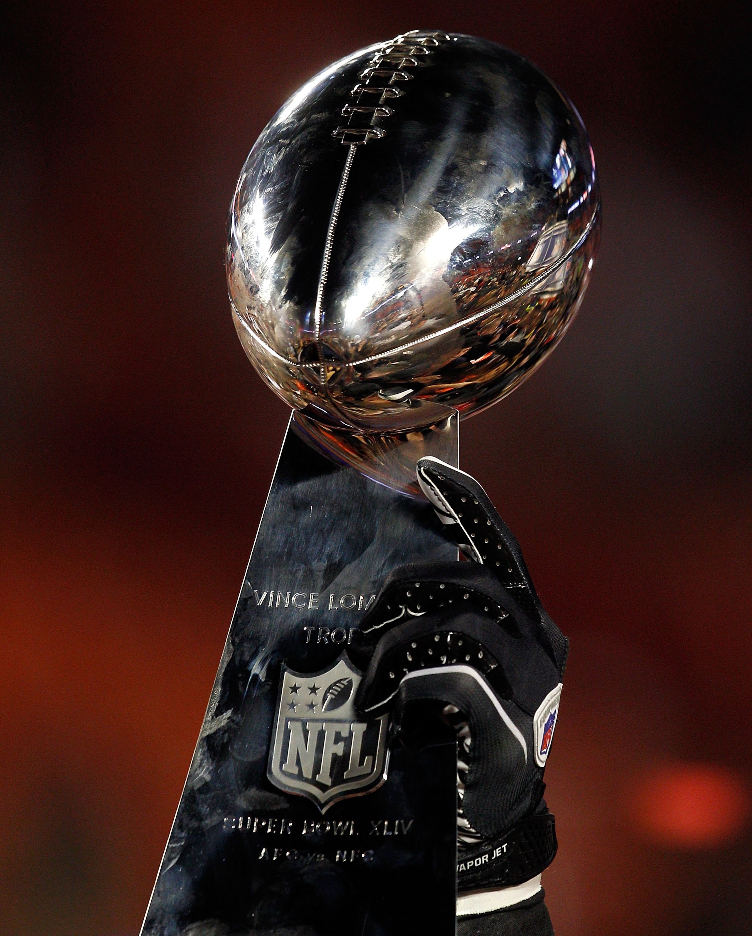 MIAMI GARDENS, FL - FEBRUARY 07:  A detail of the Vince Lombardi Trophy as the New Orleans Saints celebrate after defeating the Indianapolis Colts during Super Bowl XLIV on February 7, 2010 at Sun Life Stadium in Miami Gardens, Florida.  (Photo by Jonatha