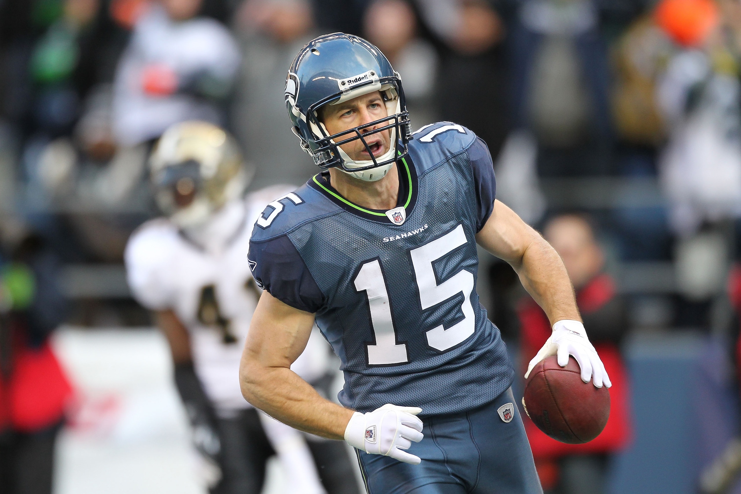 SEATTLE, WA - JANUARY 08:  Brandon Stokley #15 of the Seattle Seahawks reacts after his 45-yard touchdown catch late in the second quarter against the New Orleans Saints during the 2011 NFC wild-card playoff game at Qwest Field on January 8, 2011 in Seatt