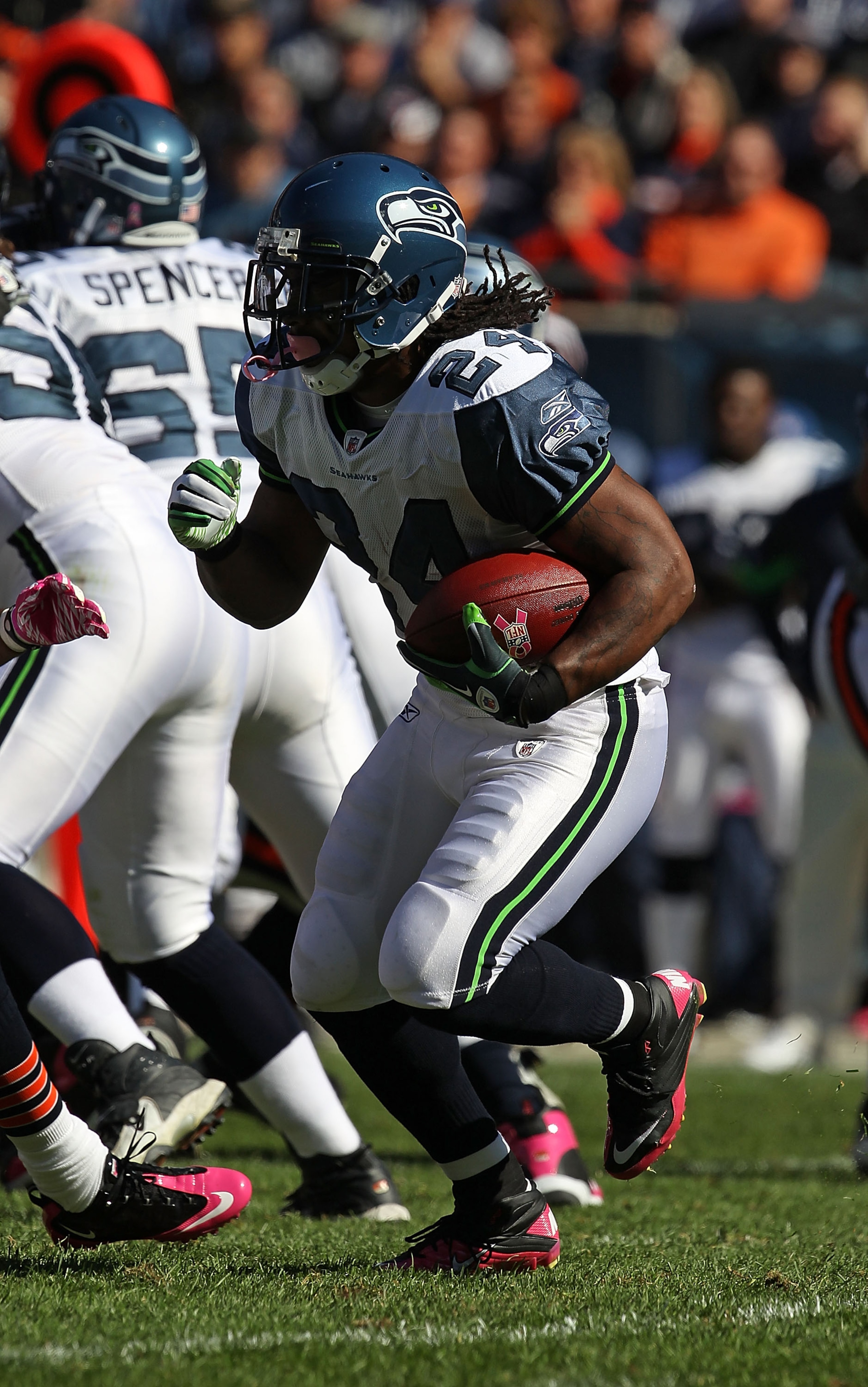 CHICAGO - OCTOBER 17: Marshawn Lynch #24 of the Seattle Seahawks runs against the Chicago Bears at Soldier Field on October 17, 2010 in Chicago, Illinois. The Seahawks defeated the Bears 23-20.  (Photo by Jonathan Daniel/Getty Images)
