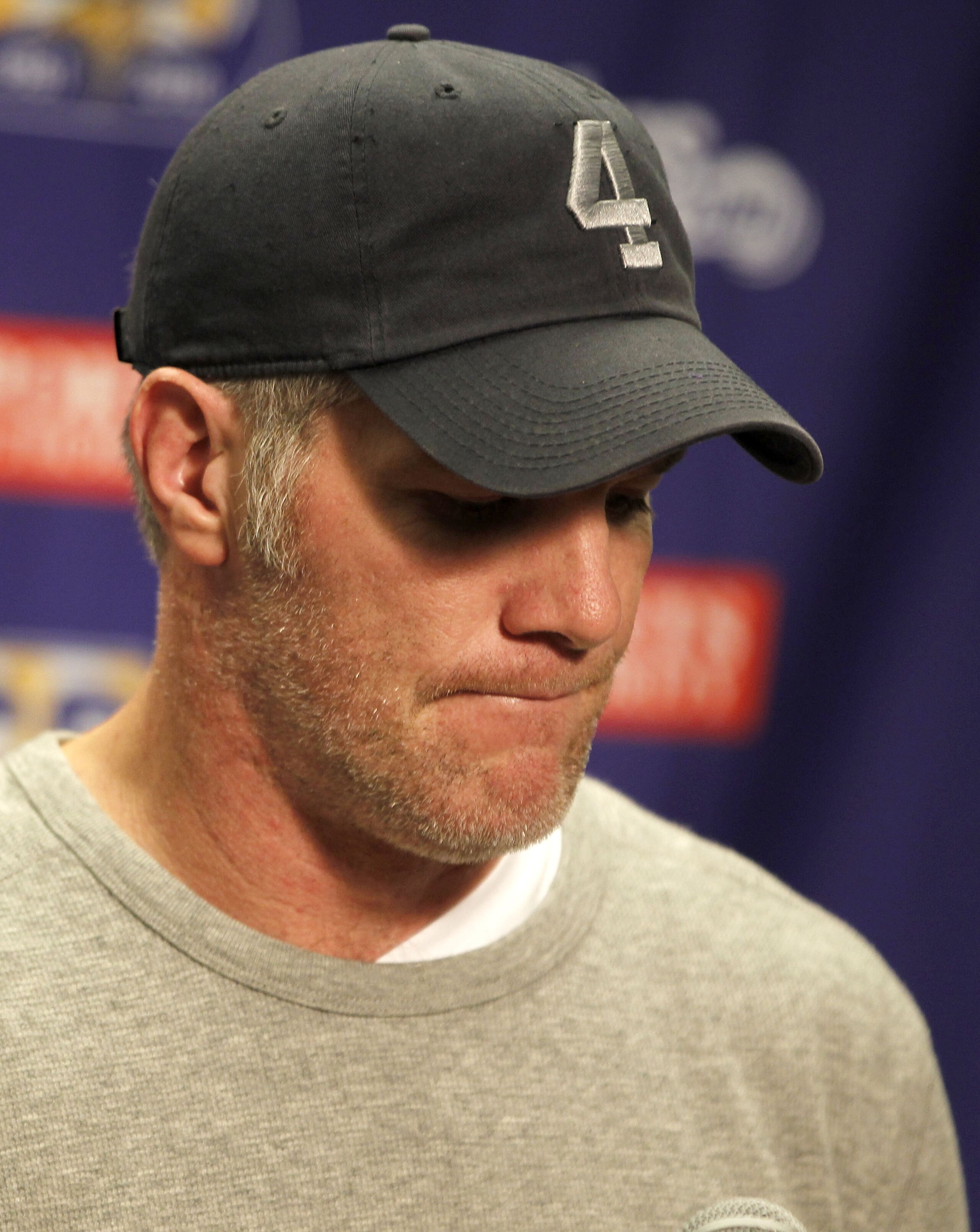 DETROIT, MI - JANUARY 02:  Brett Favre #4 of the Minnesota Vikings talks at a post game press conference after a 13-20 loss to the Detroit Lions at Ford Field on January 2, 2011 in Detroit, Michigan.  (Photo by Gregory Shamus/Getty Images)