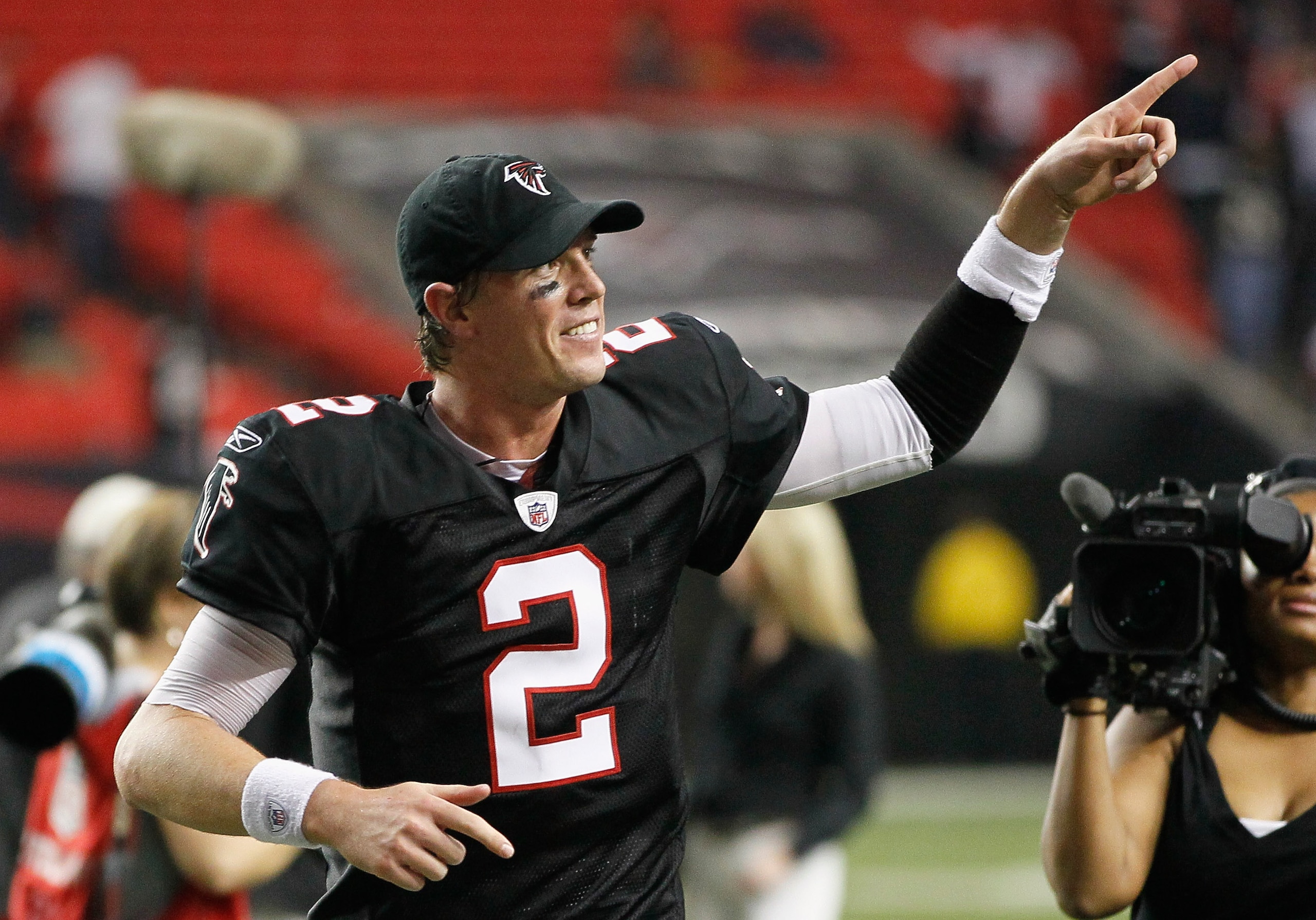 ATLANTA - NOVEMBER 11:  Quarterback Matt Ryan #2 of the Atlanta Falcons runs off the field after their 26-21 win over the Baltimore Ravens at Georgia Dome on November 11, 2010 in Atlanta, Georgia.  (Photo by Kevin C. Cox/Getty Images)