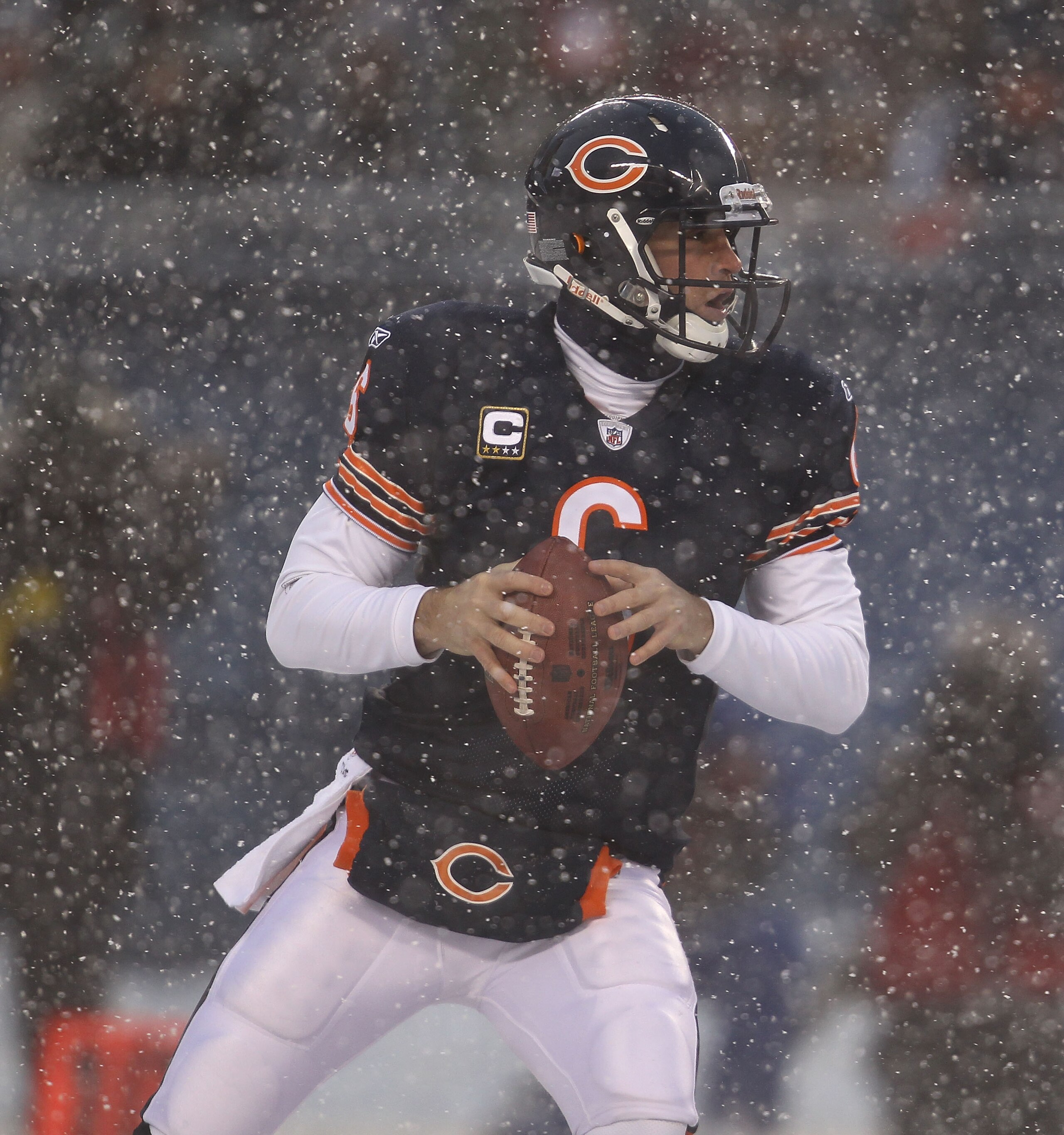 CHICAGO, IL - DECEMBER 12: Jay Cutler #6 of the Chicago Bears looks for a receiver against the New England Patriots at Soldier Field on December 12, 2010 in Chicago, Illinois. The Patriots defeated the Bears 36-7. (Photo by Jonathan Daniel/Getty Images)