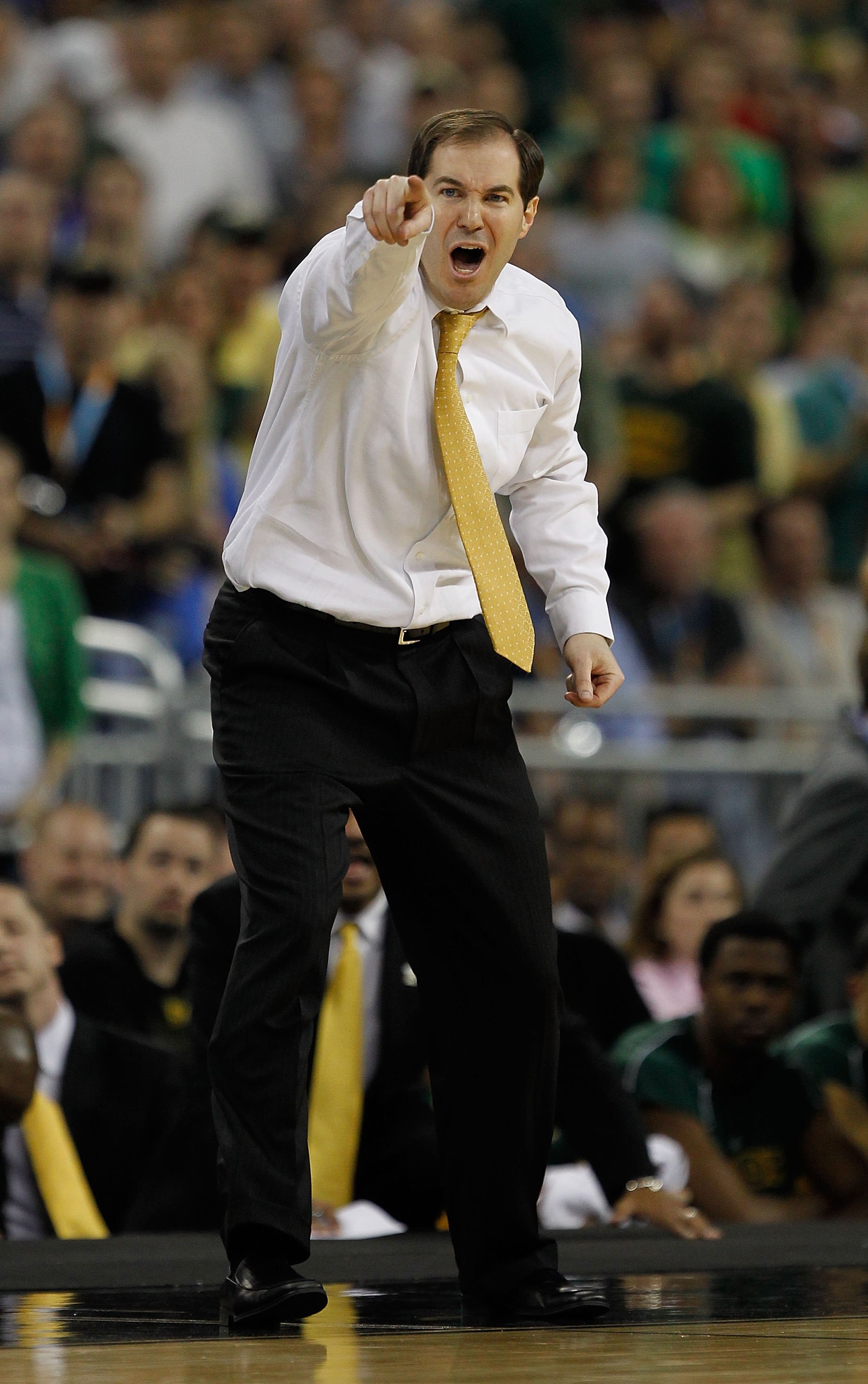 HOUSTON - MARCH 28: Head coach Scott Drew of the Baylor Bears yells instructions to his team during a game against the Duke Blue Devils in the south regional final of the 2010 NCAA men's basketball tournament at Reliant Stadium on March 28, 2010 in Housto
