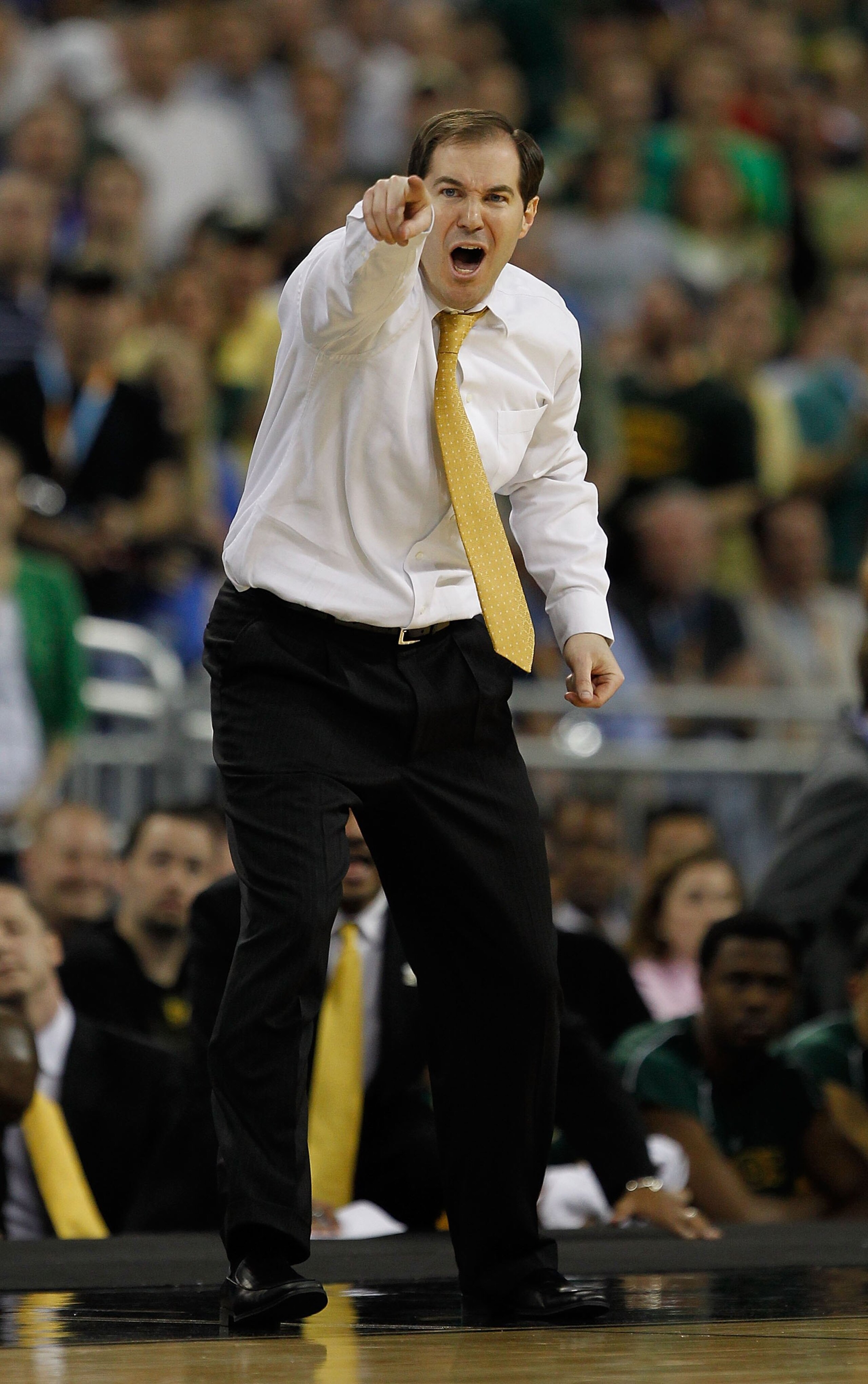 HOUSTON - MARCH 28: Head coach Scott Drew of the Baylor Bears yells instructions to his team during a game against the Duke Blue Devils in the south regional final of the 2010 NCAA men's basketball tournament at Reliant Stadium on March 28, 2010 in Housto
