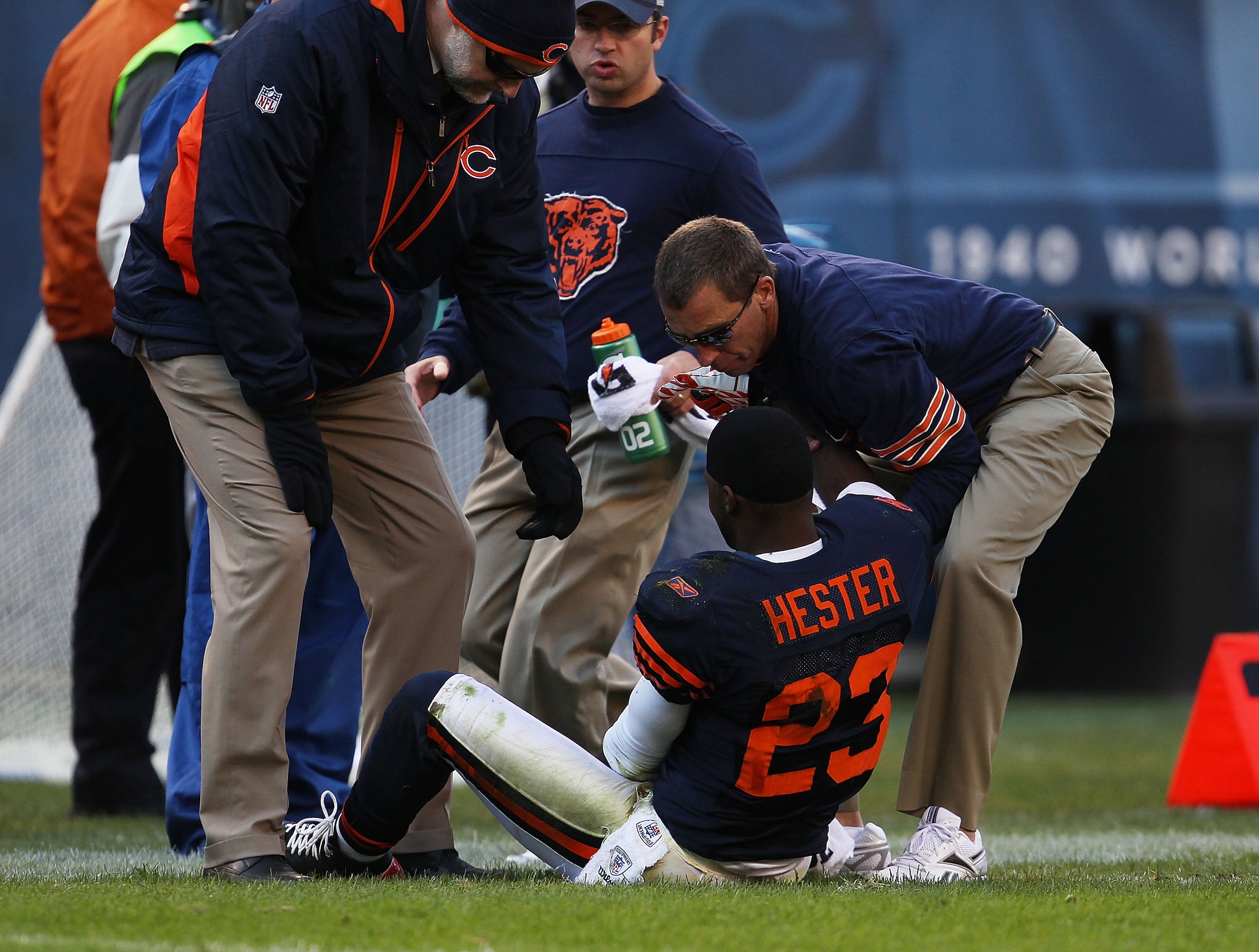 CHICAGO - NOVEMBER 14: Devin Hester #23 of the Chicago Bears is attended to by trainers and doctors after an injury against the Minnesota Vikings at Soldier Field on November 14, 2010 in Chicago, Illinois. The Bears defeated the Vikings 27-13. (Photo by J