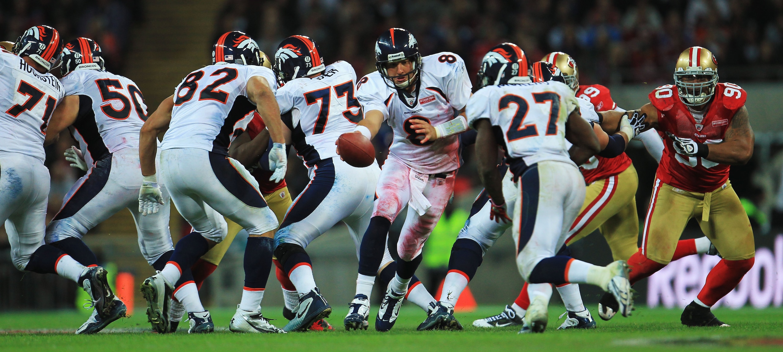 LONDON, ENGLAND - OCTOBER 31:  Kyle Orton #8 of Denver Broncos hands the ball off during the NFL International Series match between Denver Broncos and San Francisco 49ers at Wembley Stadium on October 31, 2010 in London, England. This is the fourth occasi