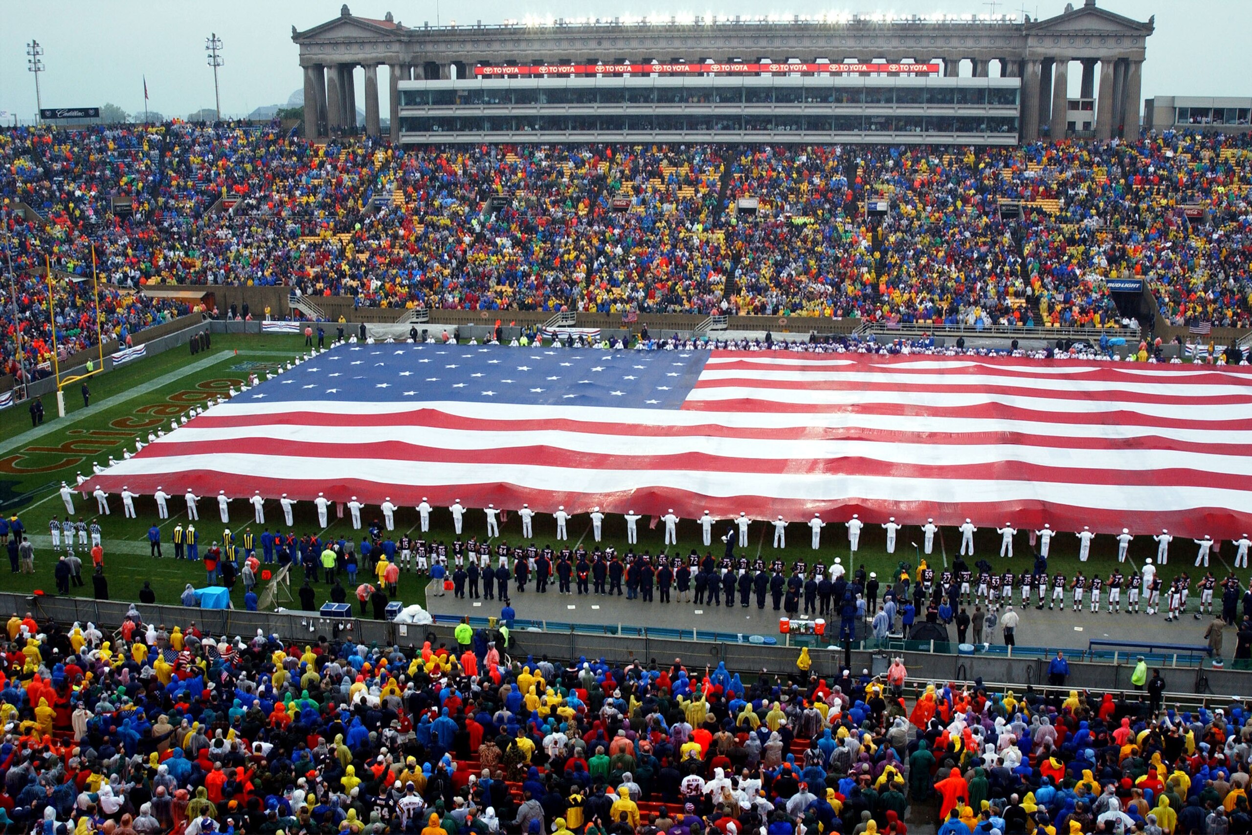 394938 01: More Than 250 Sailors Assigned To The Naval Training Center In Great Lakes, Il, Unfurl A Huge Us Flag September 23, 2001 During Opening Ceremonies At The Chicago Bears Home Game Upon Resumption Of The Regular Nfl Schedule. The Flag, Said To Be
