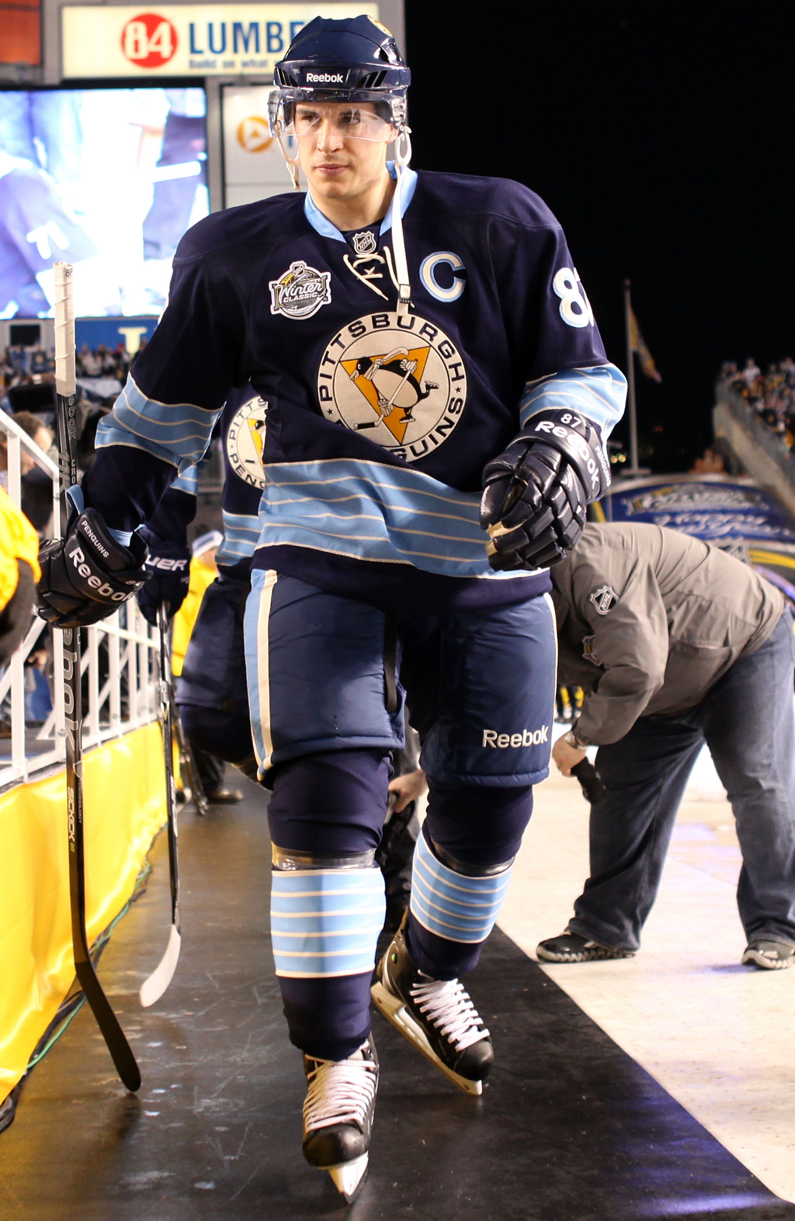 PITTSBURGH, PA - JANUARY 01:  Captain Sidney Crosby #87 of the Pittsburgh Penguins walks out to the ice before playing against the Washington Capitals during the 2011 NHL Bridgestone Winter Classic at Heinz Field on January 1, 2011 in Pittsburgh, Pennsylv