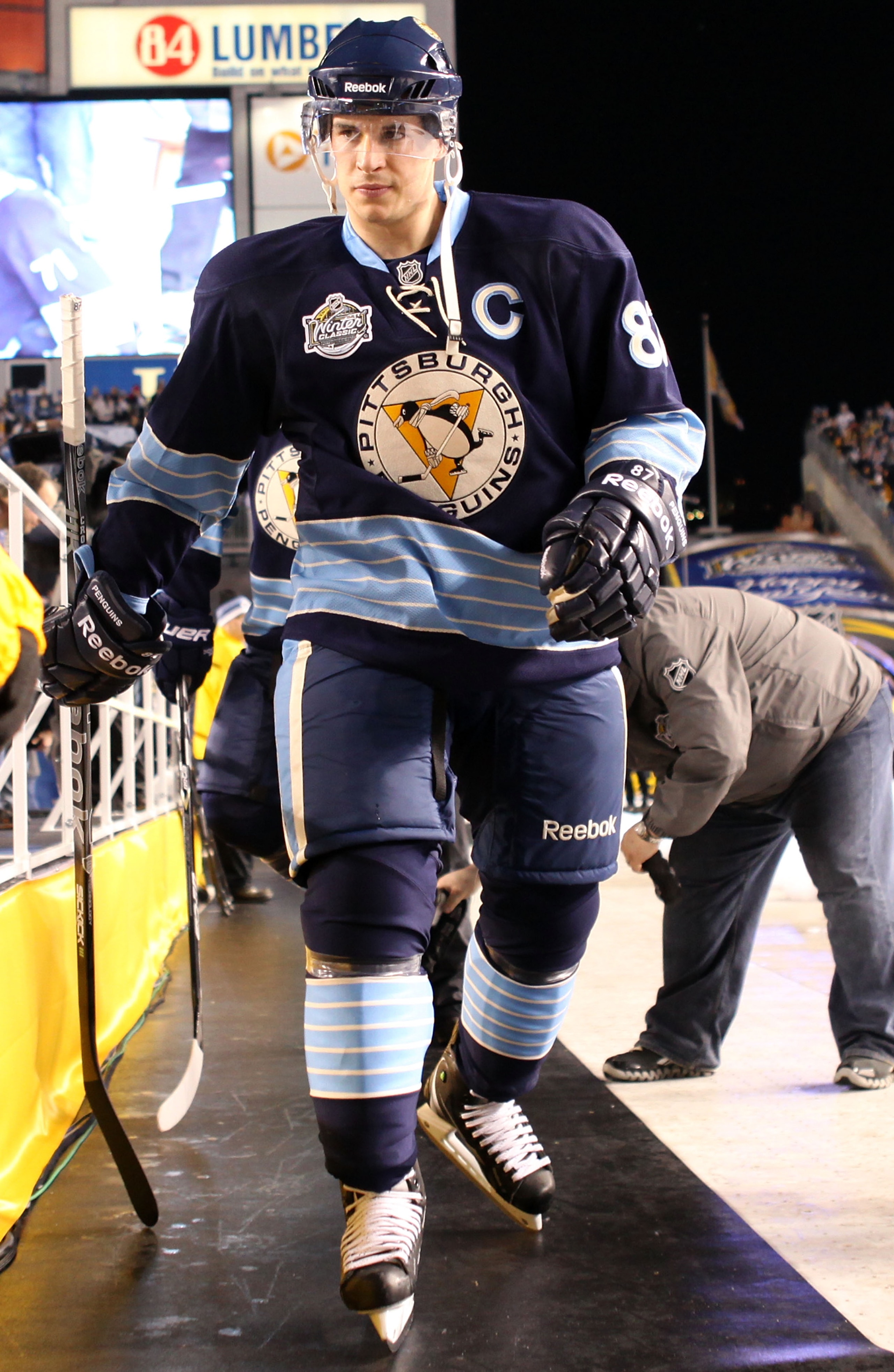 PITTSBURGH, PA - JANUARY 01:  Captain Sidney Crosby #87 of the Pittsburgh Penguins walks out to the ice before playing against the Washington Capitals during the 2011 NHL Bridgestone Winter Classic at Heinz Field on January 1, 2011 in Pittsburgh, Pennsylv