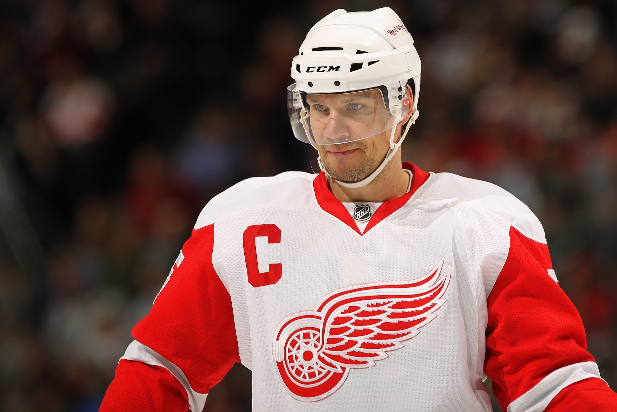 DENVER, CO - JANUARY 10:  Nicklas Lidstrom #5 and captain of the Detroit Red Wings looks as he awaits a face off against the Colorado Avalanche at the Pepsi Center on January 10, 2011 in Denver, Colorado. MacDonald replaced starting goalie Jimmy Howard in