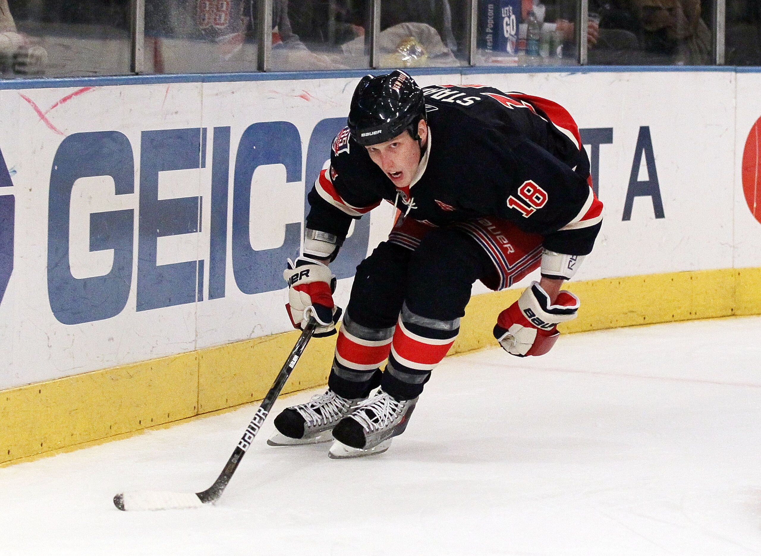 NEW YORK, NY - JANUARY 11:  Marc Staal #18 of the New York Rangers skates against the Montreal Canadiens on January 11, 2011 at Madison Square Garden in New York City. Montreal defeated the Rangers 2-1.  (Photo by Jim McIsaac/Getty Images)