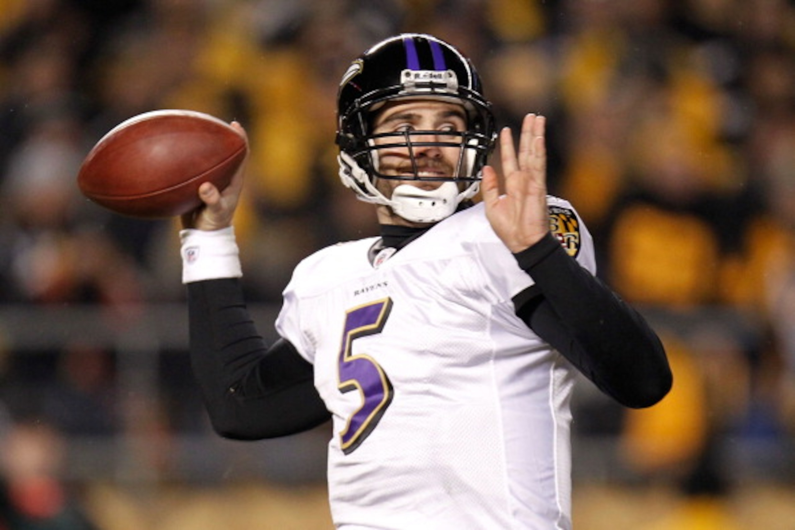 PITTSBURGH, PA - JANUARY 15:  Quarterback Joe Flacco #5 of the Baltimore Ravens looks to pass against the Pittsburgh Steelers in the AFC Divisional Playoff Game at Heinz Field on January 15, 2011 in Pittsburgh, Pennsylvania.  (Photo by Gregory Shamus/Gett