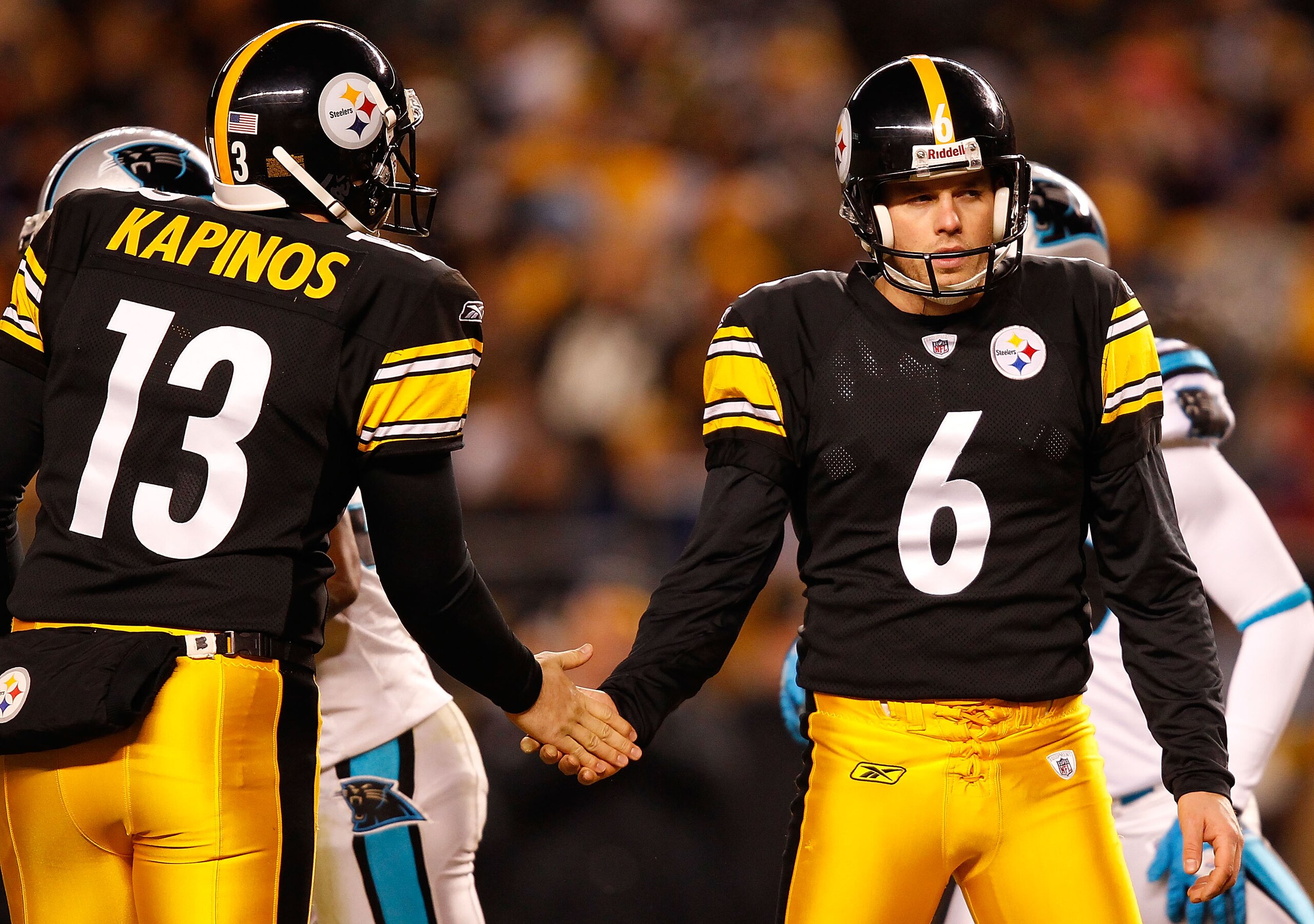 PITTSBURGH - DECEMBER 23:  Shaun Suisham #6 of the Pittsburgh Steelers is congratulated by teammates after kicking a field goal against the Carolina Panthers during the game on December 23, 2010 at Heinz Field in Pittsburgh, Pennsylvania.  (Photo by Jared