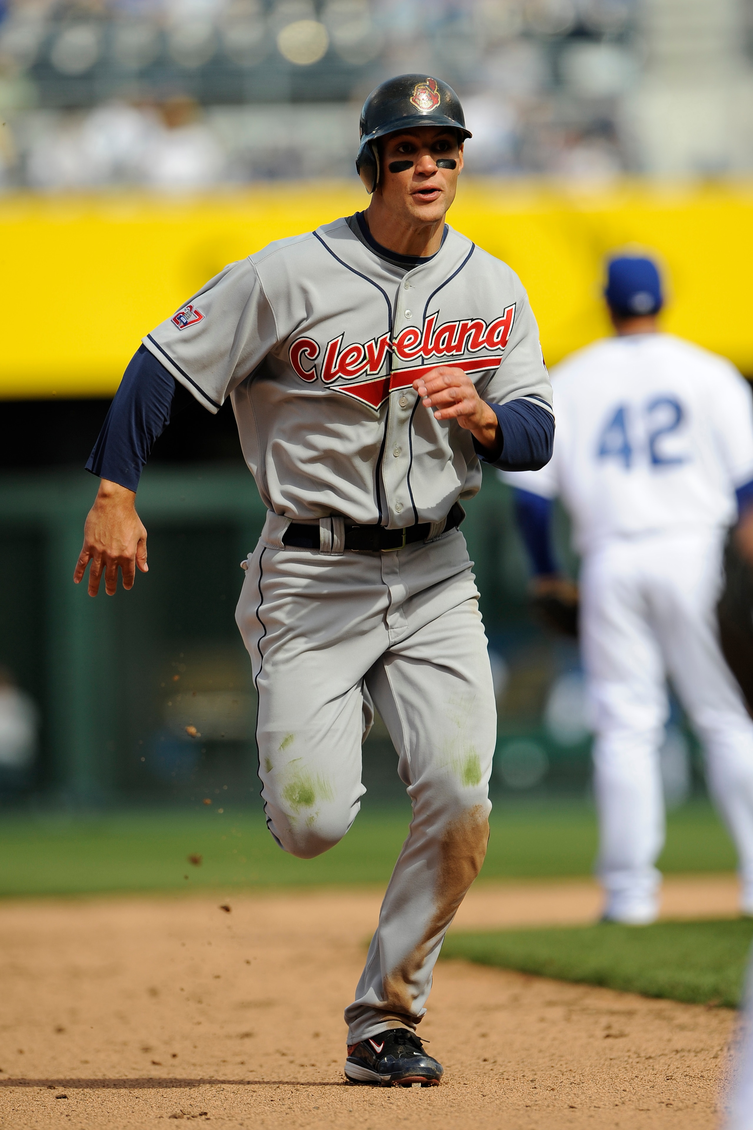 KANSAS CITY, MO - APRIL 15:  Grady Sizemore of the Cleveland Indians, wearing a #42 jersey during the Jackie Robinson Day game runs to third base against the Kansas City Royals on April 15, 2009 at Kauffman Stadium in Kansas City, Missouri.  (Photo by G.
