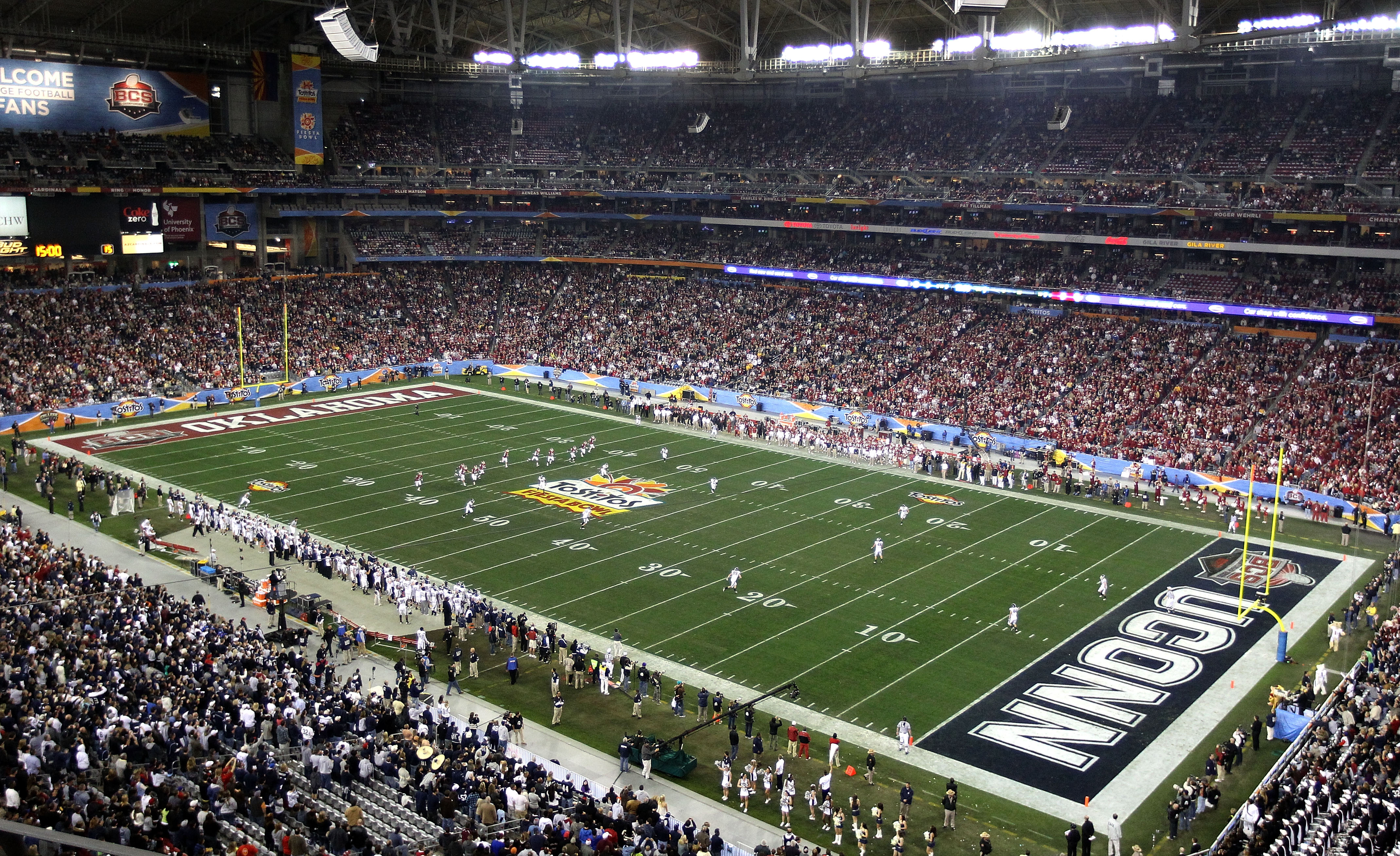 GLENDALE, AZ - JANUARY 01:  A general view of the opening kickoff to start the Tostitos Fiesta Bowl between the Oklahoma Sooners and the Connecticut Huskies at the Universtity of Phoenix Stadium on January 1, 2011 in Glendale, Arizona.  (Photo by Christia