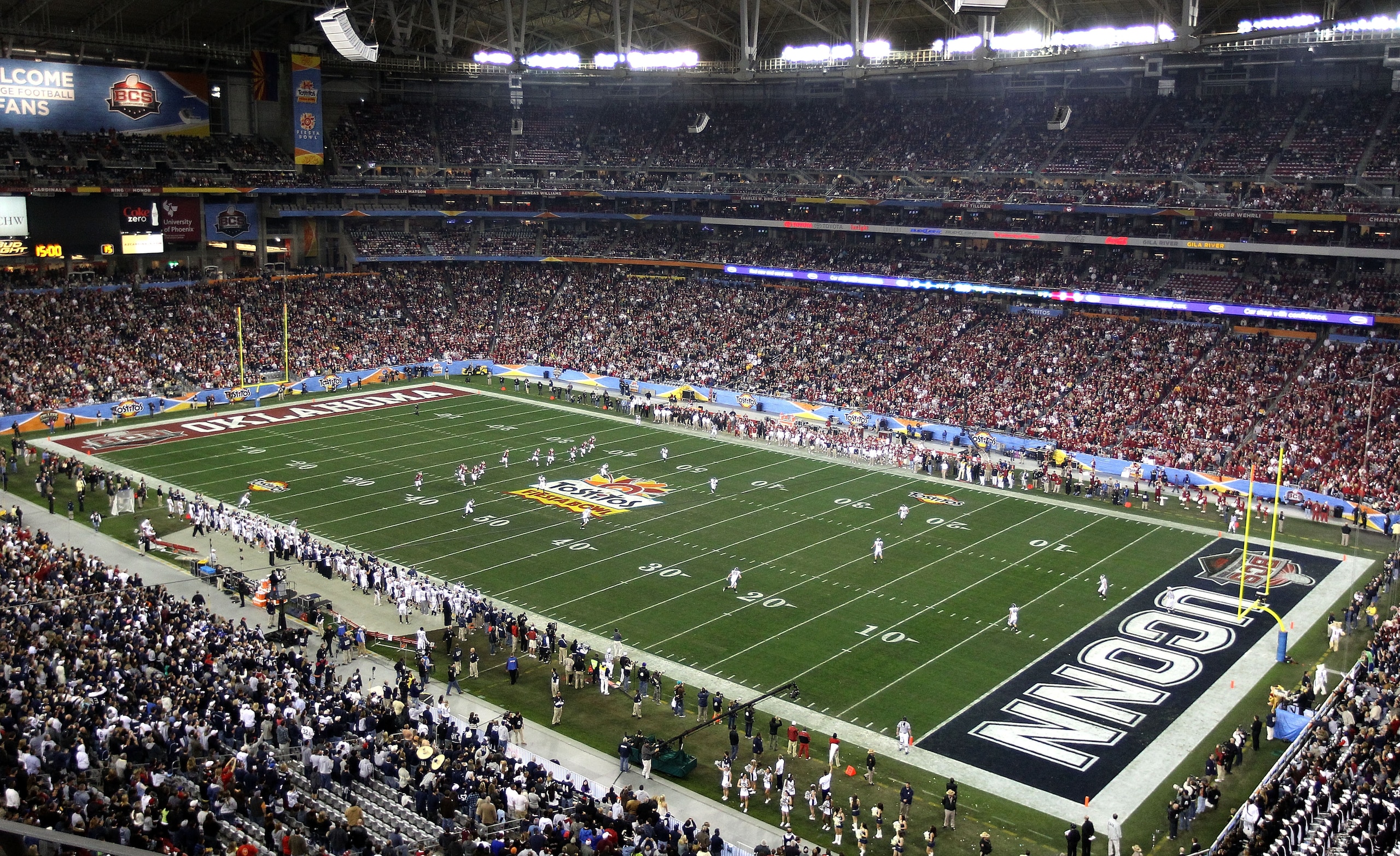 GLENDALE, AZ - JANUARY 01:  A general view of the opening kickoff to start the Tostitos Fiesta Bowl between the Oklahoma Sooners and the Connecticut Huskies at the Universtity of Phoenix Stadium on January 1, 2011 in Glendale, Arizona.  (Photo by Christia