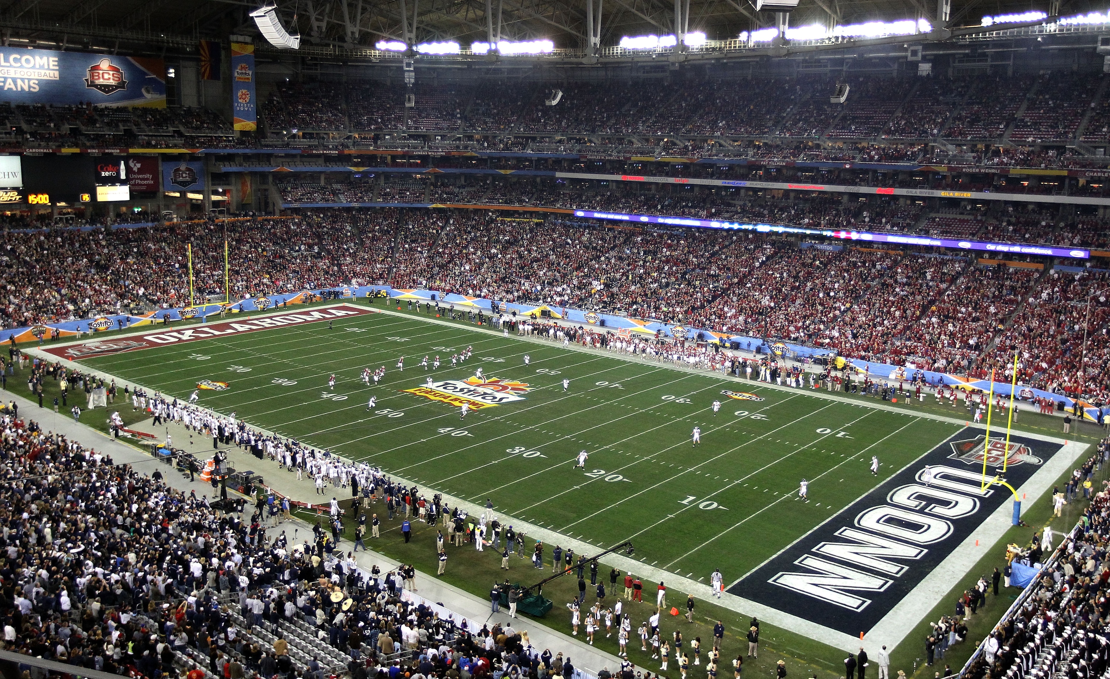 GLENDALE, AZ - JANUARY 01:  A general view of the opening kickoff to start the Tostitos Fiesta Bowl between the Oklahoma Sooners and the Connecticut Huskies at the Universtity of Phoenix Stadium on January 1, 2011 in Glendale, Arizona.  (Photo by Christia