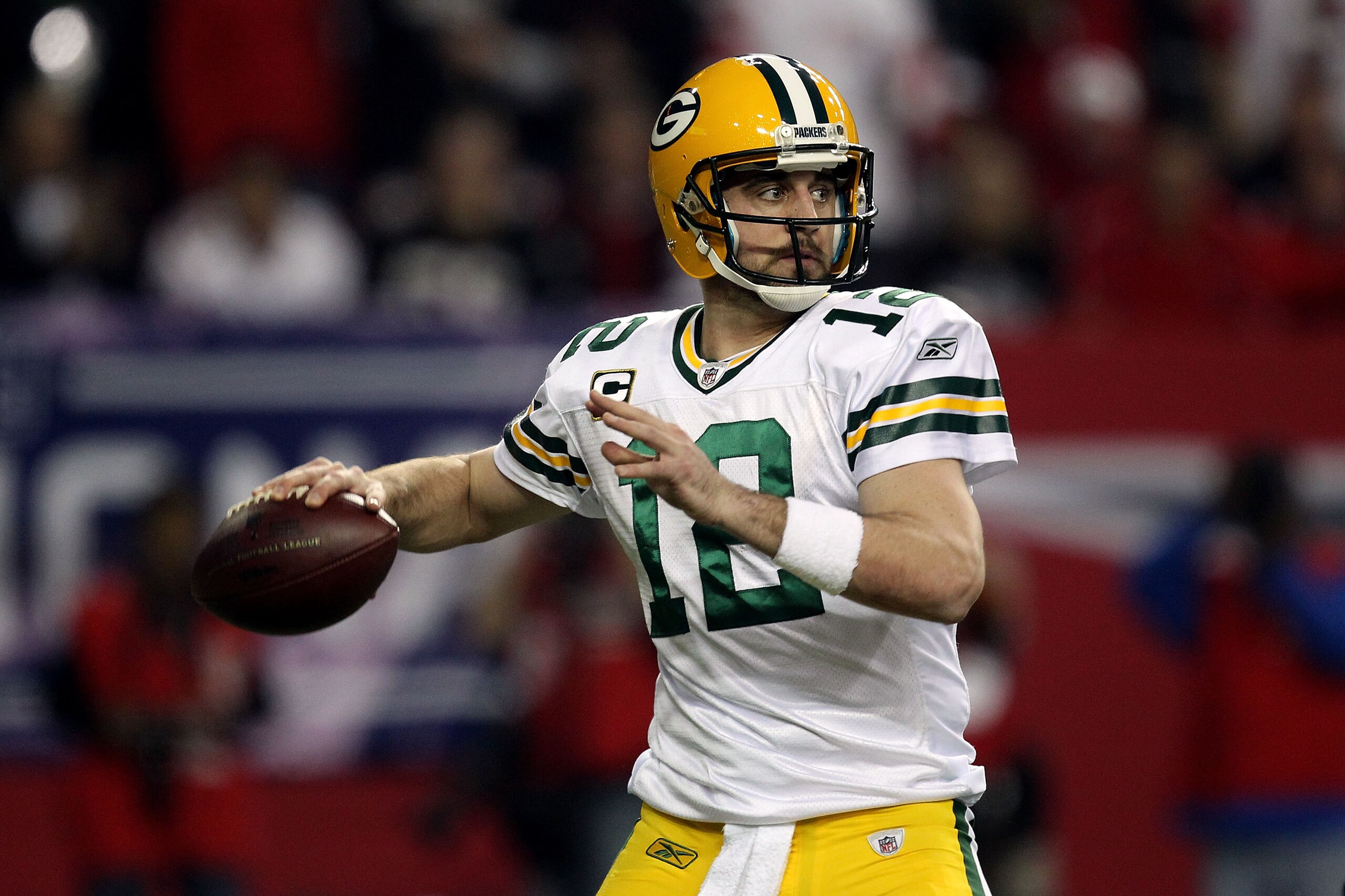 ATLANTA, GA - JANUARY 15: Aaron Rodgers #12 of the Green Bay Packers throws a pass against the Atlanta Falcons during their 2011 NFC divisional playoff game at Georgia Dome on January 15, 2011 in Atlanta, Georgia. (Photo by Streeter Lecka/Getty Images) ATLANTA, GA - JANUARY 15: Aaron Rodgers #12 of the Green Bay Packers throws a pass against the Atlanta Falcons during their 2011 NFC divisional playoff game at Georgia Dome on January 15, 2011 in Atlanta, Georgia. (Photo by Streeter Lecka/Getty Images)