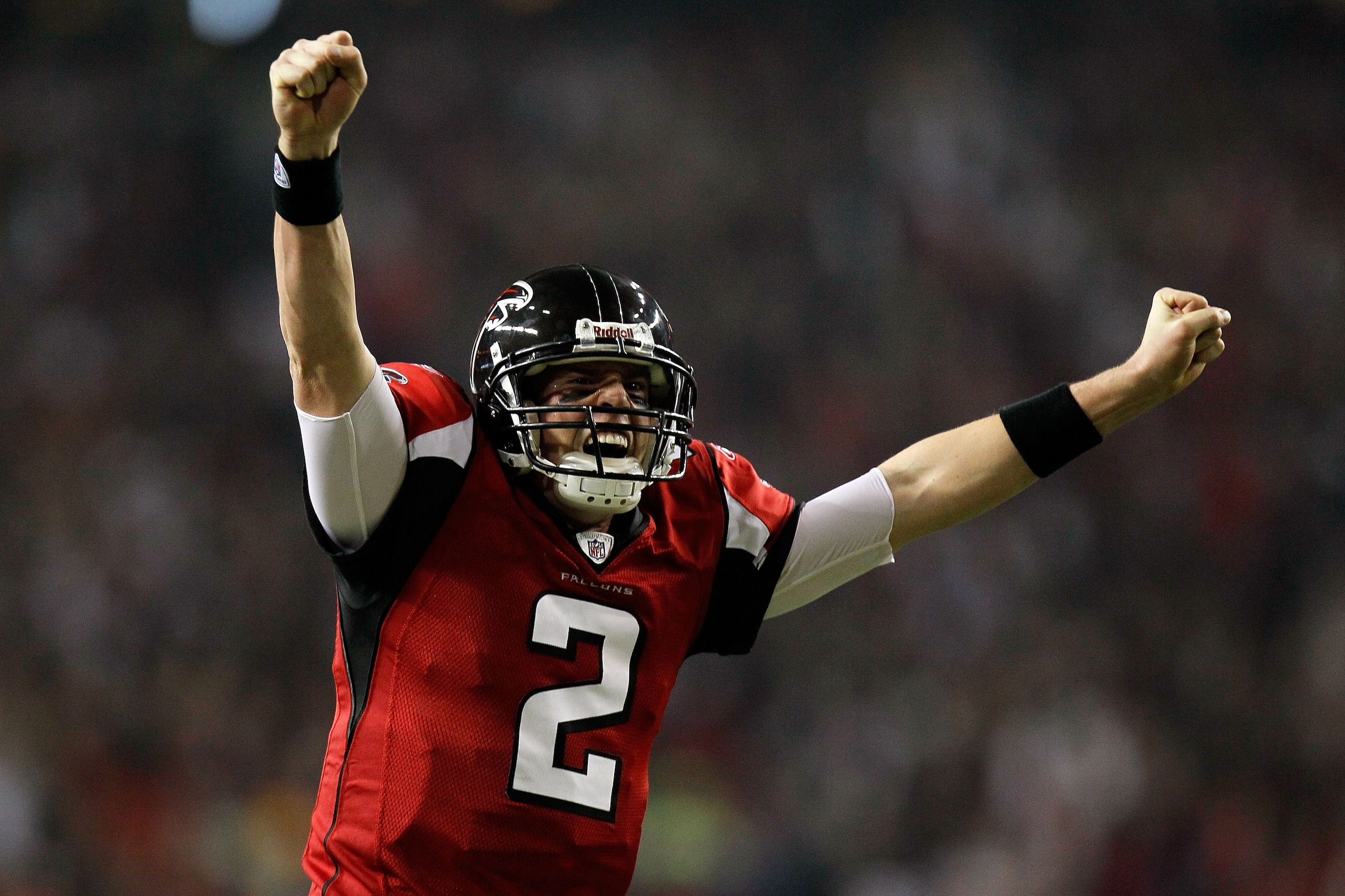 ATLANTA, GA - JANUARY 15: Matt Ryan #2 of the Atlanta Falcons reacts after Michael Turner #33 scored a 12-yard rushing touchdown in the first quarter against the Green Bay Packers during their 2011 NFC divisional playoff game at Georgia Dome on January 1 ATLANTA, GA - JANUARY 15: Matt Ryan #2 of the Atlanta Falcons reacts after Michael Turner #33 scored a 12-yard rushing touchdown in the first quarter against the Green Bay Packers during their 2011 NFC divisional playoff game at Georgia Dome on January 1