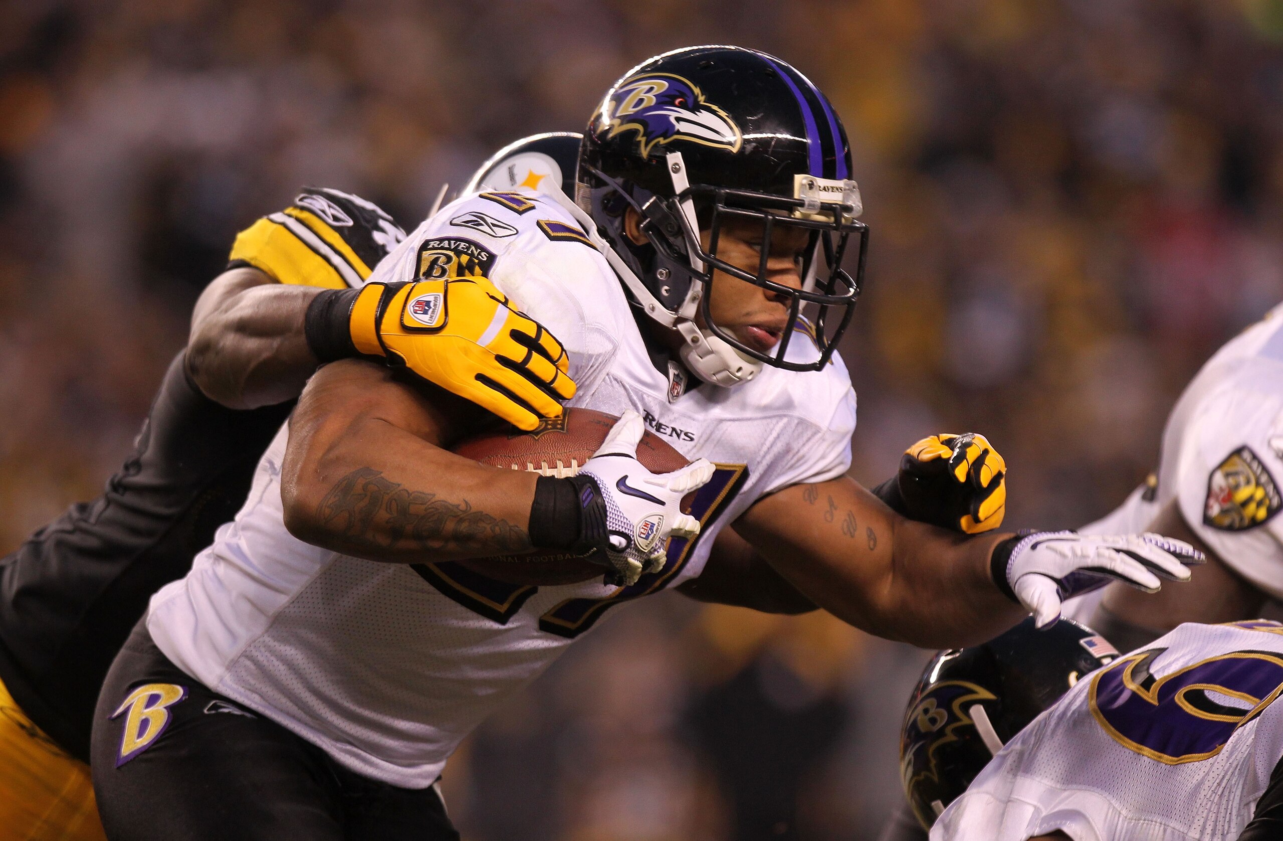 PITTSBURGH, PA - JANUARY 15:  Running back Ray Rice #27 of the Baltimore Ravens rushes with the ball against the Pittsburgh Steelers in the AFC Divisional Playoff Game at Heinz Field on January 15, 2011 in Pittsburgh, Pennsylvania.  (Photo by Nick Laham/G