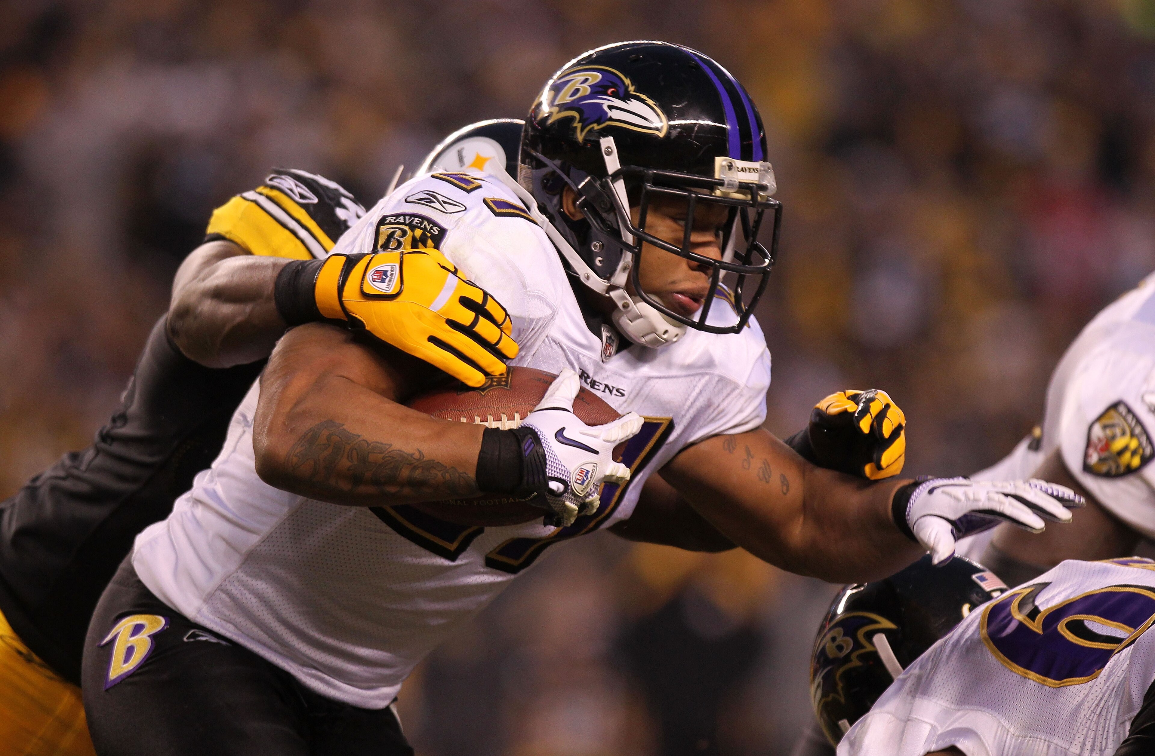 PITTSBURGH, PA - JANUARY 15:  Running back Ray Rice #27 of the Baltimore Ravens rushes with the ball against the Pittsburgh Steelers in the AFC Divisional Playoff Game at Heinz Field on January 15, 2011 in Pittsburgh, Pennsylvania.  (Photo by Nick Laham/G