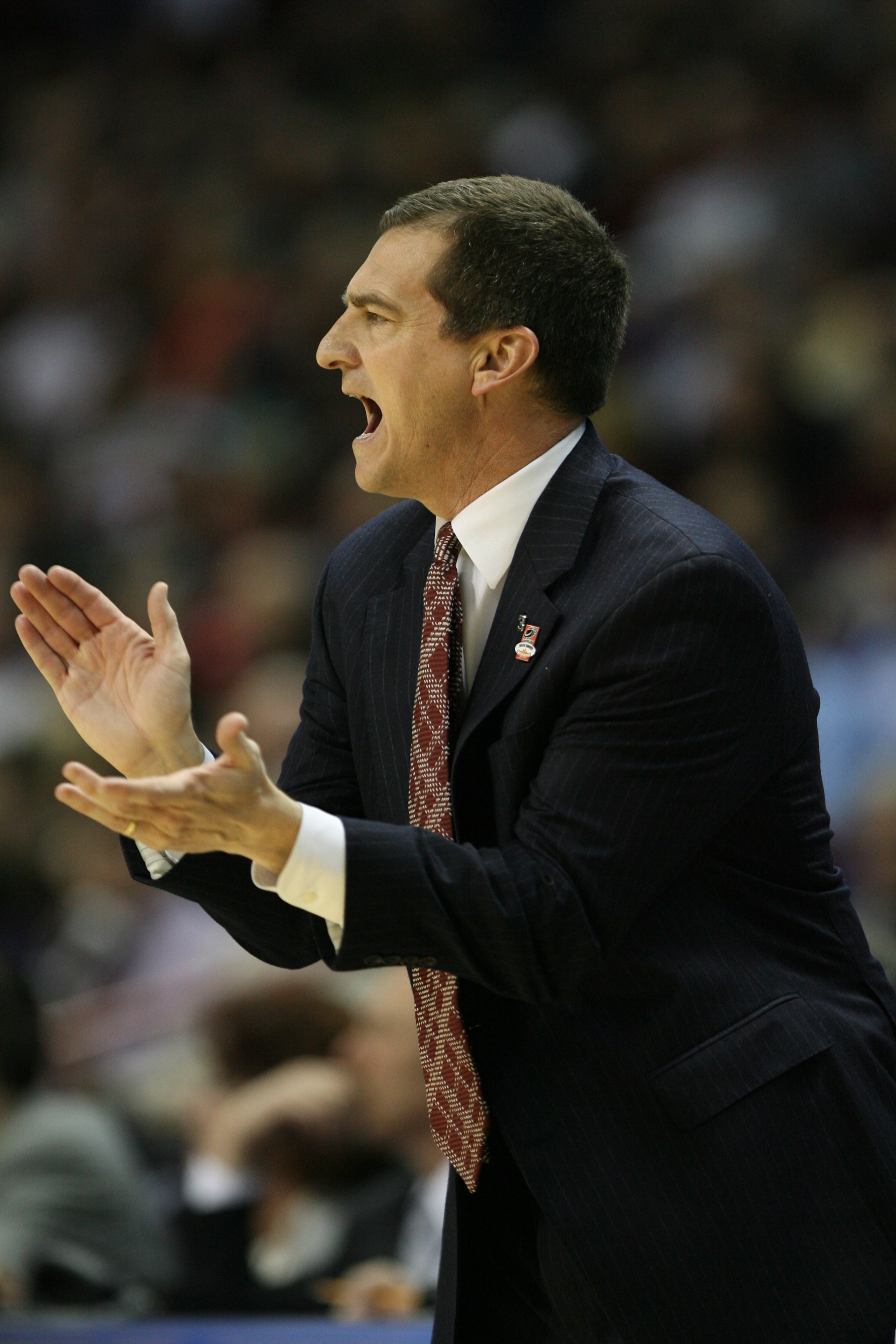 SPOKANE - MARCH 19:  Head coach Mark Turgeon of the Texas A&M  Aggies claps against the Utah State Aggies during the first round of the 2010 NCAA men's basketball tournament at the Spokane Arena on March 19, 2010 in Spokane, Washington. (Photo by Otto Gre