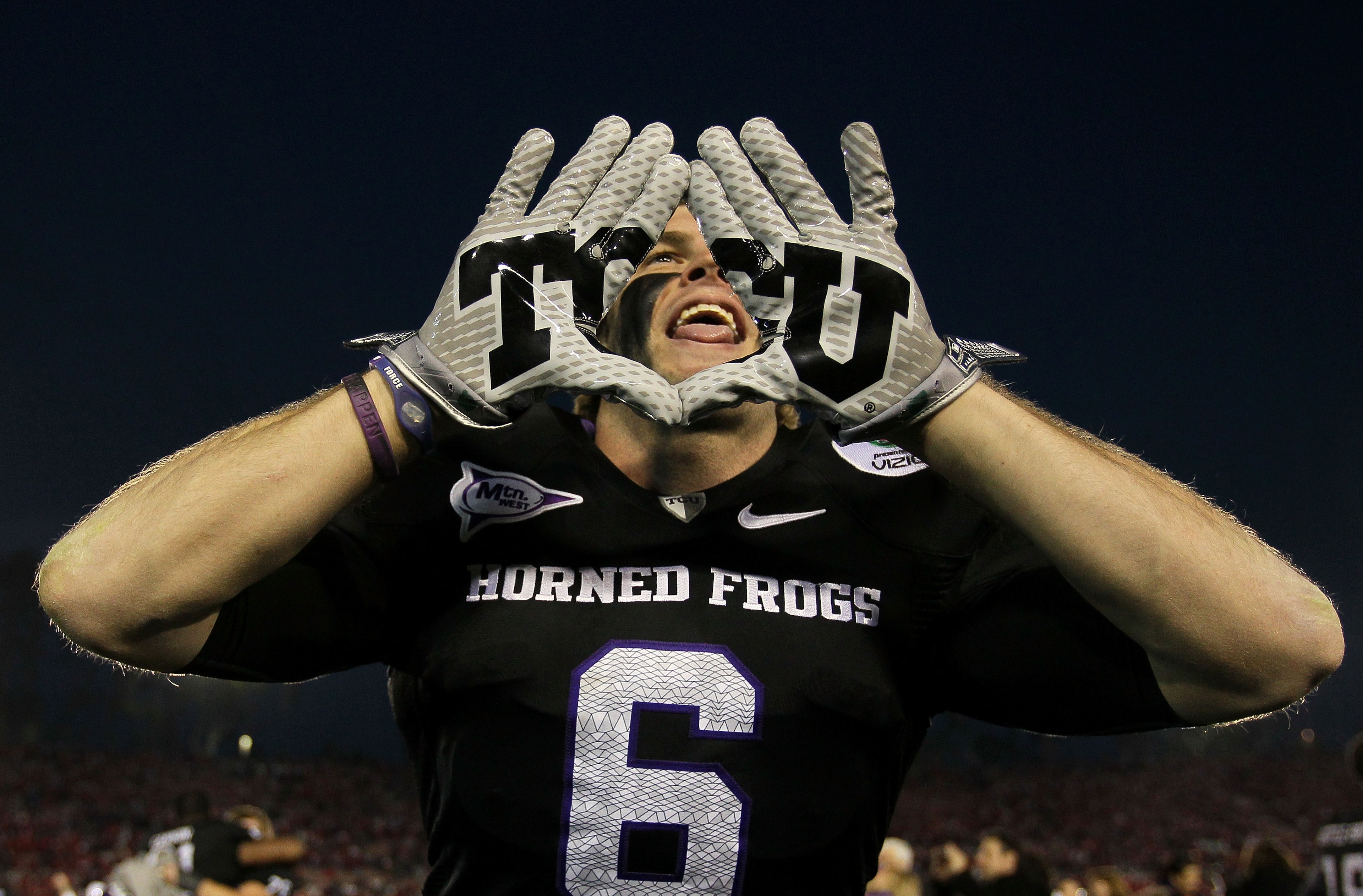 PASADENA, CA - JANUARY 01:  Wide receiver Bart Johnson #6 of the TCU Horned Frogs celebrates after defeating the Wisconsin Badgers 21-19 in the 97th Rose Bowl game on January 1, 2011 in Pasadena, California.  (Photo by Jeff Gross/Getty Images)