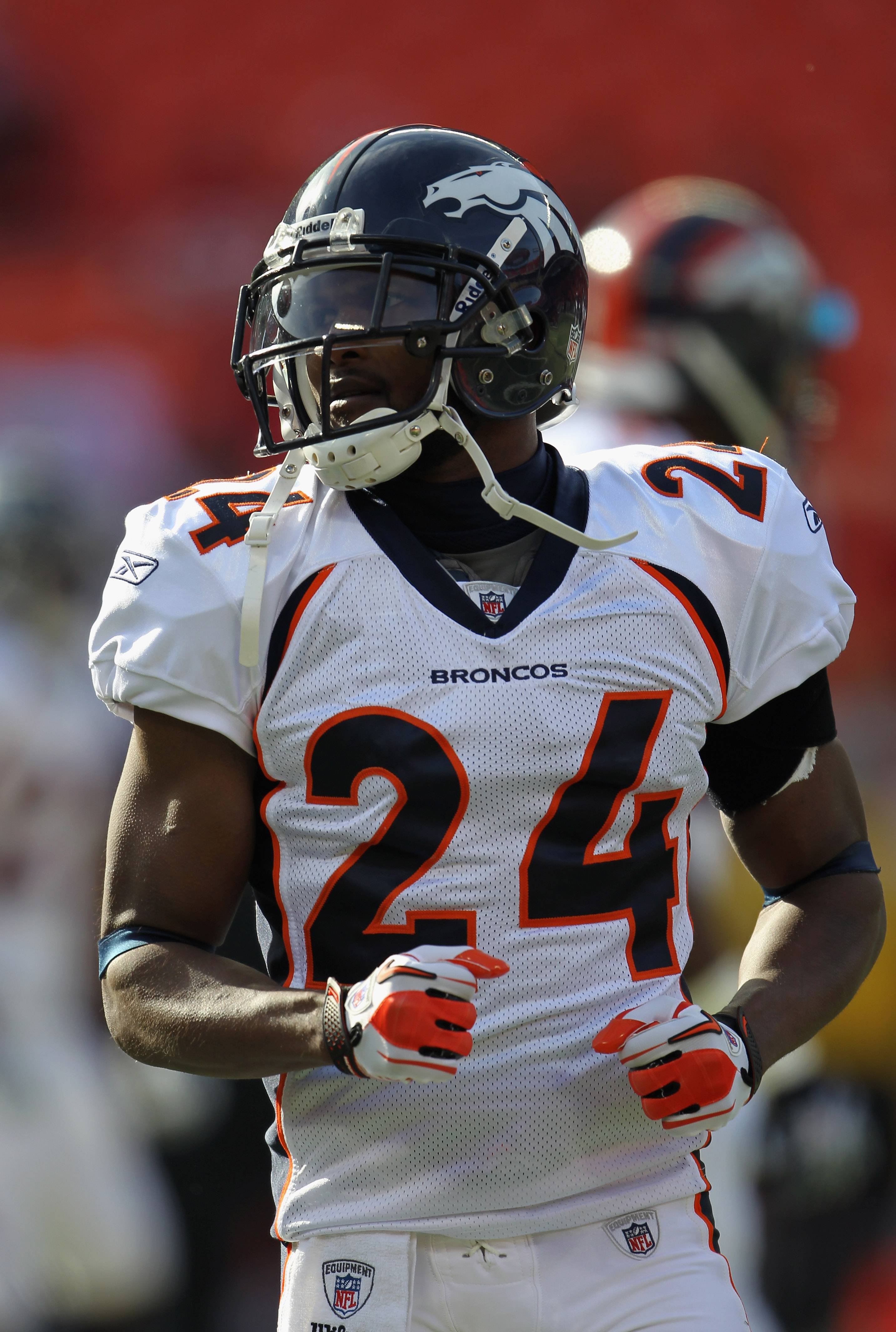 Denver Broncos cornerback Champ Bailey (24) defends against Houston Texans  wide receiver Andre Johnson during the third quarter at Sports Authority  Field at Mile High on September 23, 2012 in Denver. Johnson