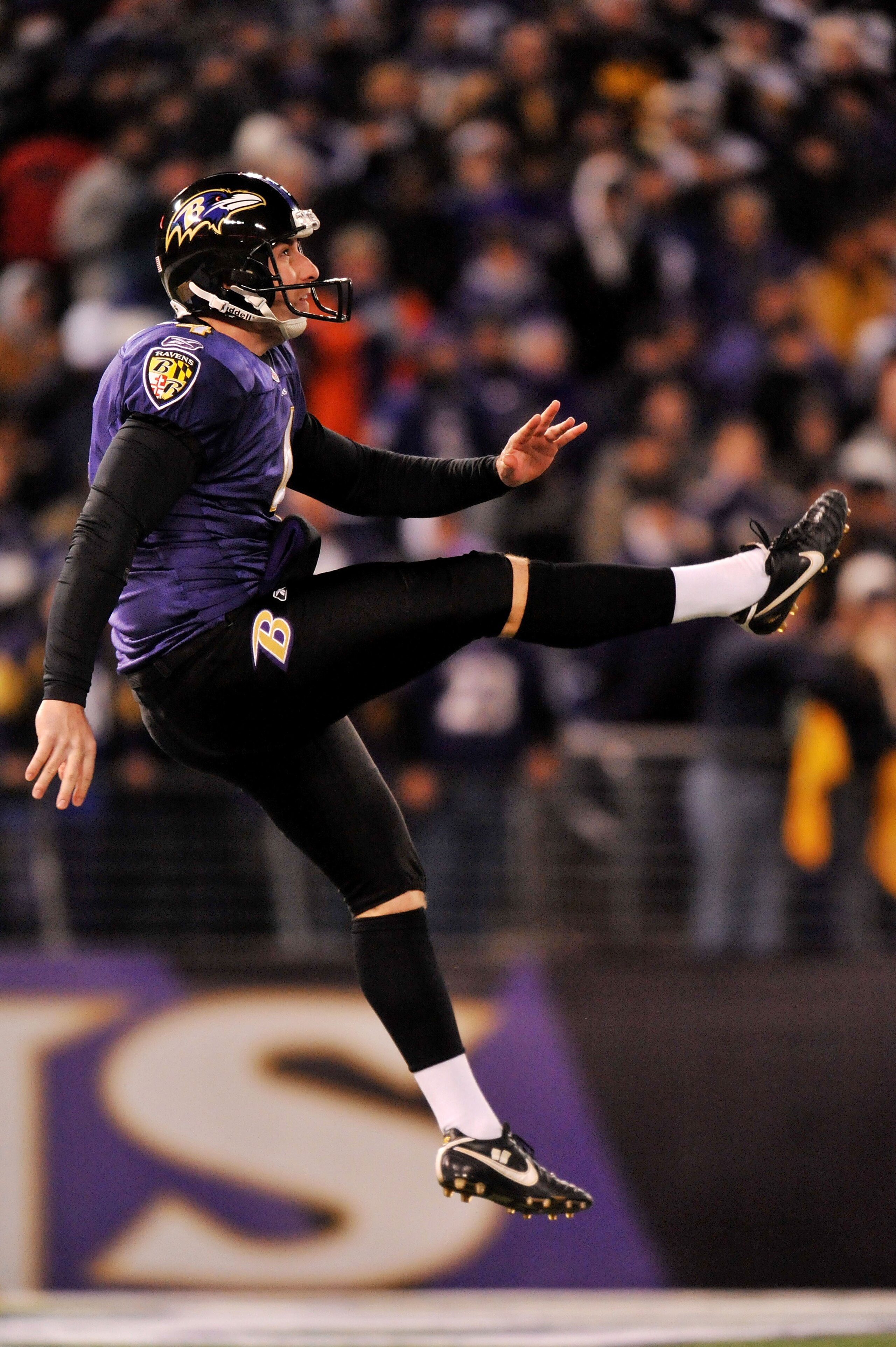 BALTIMORE, MD - DECEMBER 05:  Punter Sam Koch #4 of the Baltimore Ravens punts the ball to the Pittsburgh Steelers during the first quarter of the game at M&T Bank Stadium on December 5, 2010 in Baltimore, Maryland.  (Photo by Larry French/Getty Images)