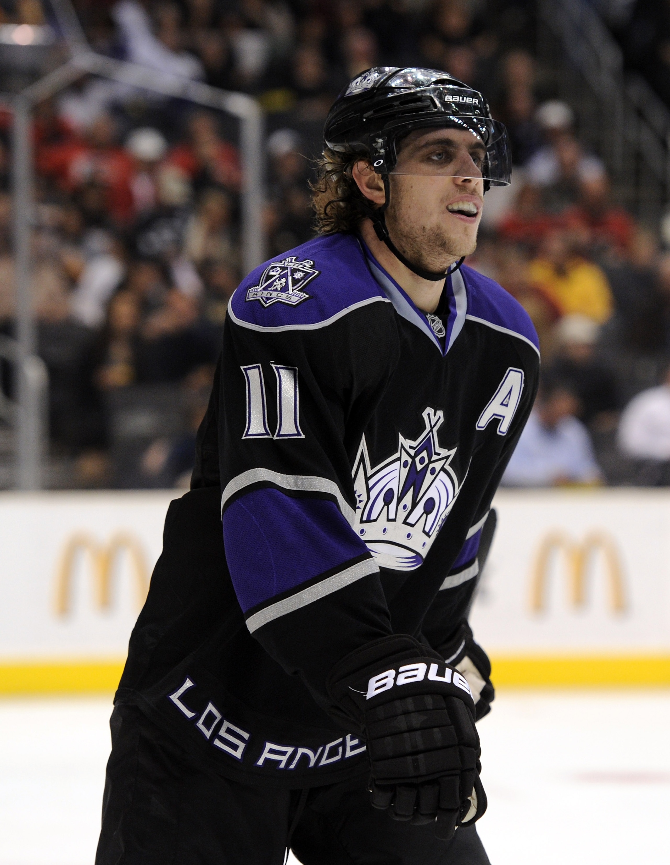LOS ANGELES, CA - DECEMBER 09:  Anze Kopitar #11 of the Los Angeles Kings skates to the bench against the Calgary Flames at the Staples Center on December 9, 2010 in Los Angeles, California.  (Photo by Harry How/Getty Images)