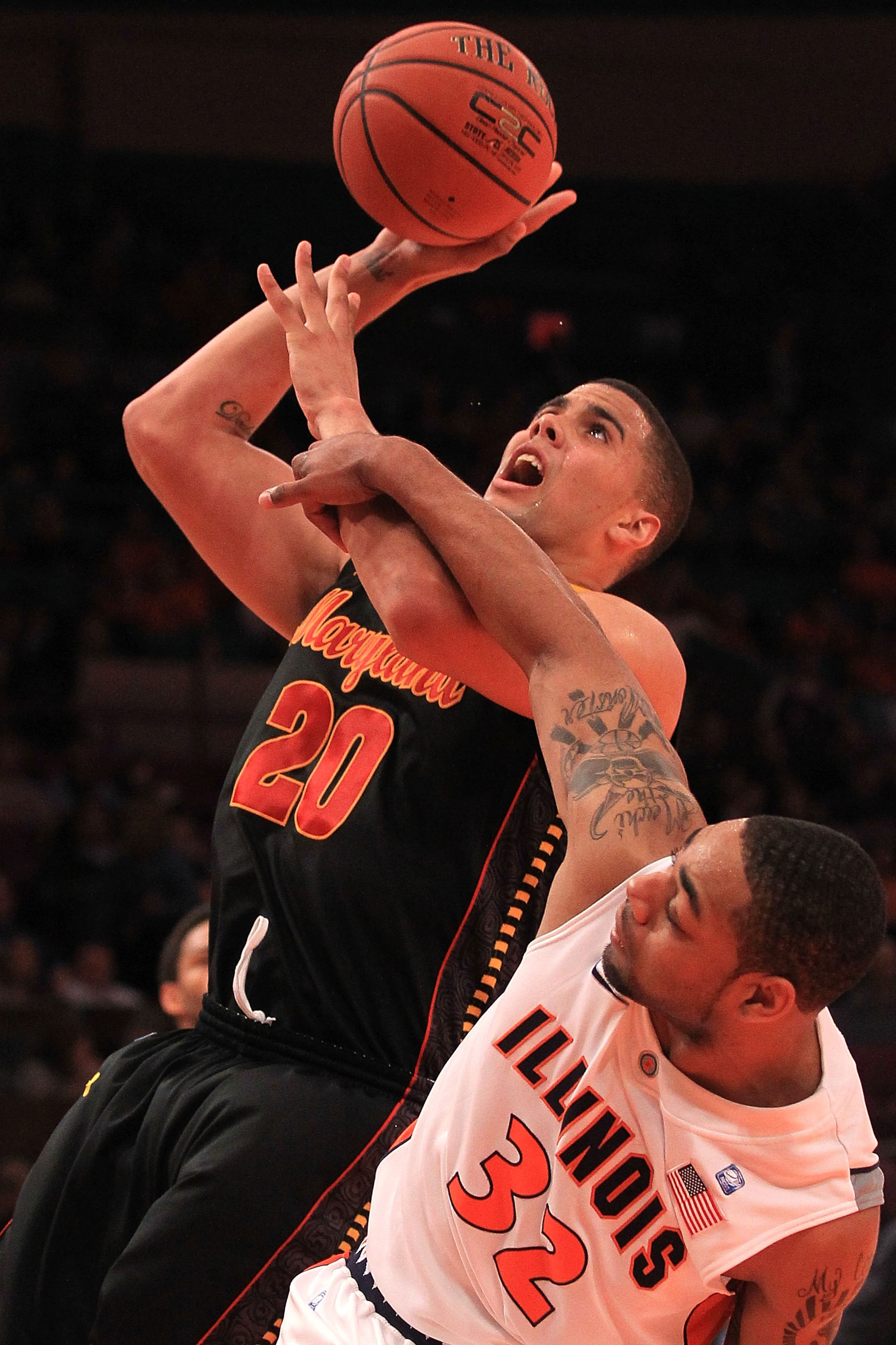 NEW YORK - NOVEMBER 19: Jordan Williams #20 of the Maryland Terrapins is fouled by Demetri McCamey #32 of the Illinois Fighting Illini during the 2k Sports Classic at Madison Square Garden on November 19, 2010 in New York, New York. (Photo by Chris McGr NEW YORK - NOVEMBER 19: Jordan Williams #20 of the Maryland Terrapins is fouled by Demetri McCamey #32 of the Illinois Fighting Illini during the 2k Sports Classic at Madison Square Garden on November 19, 2010 in New York, New York. (Photo by Chris McGr