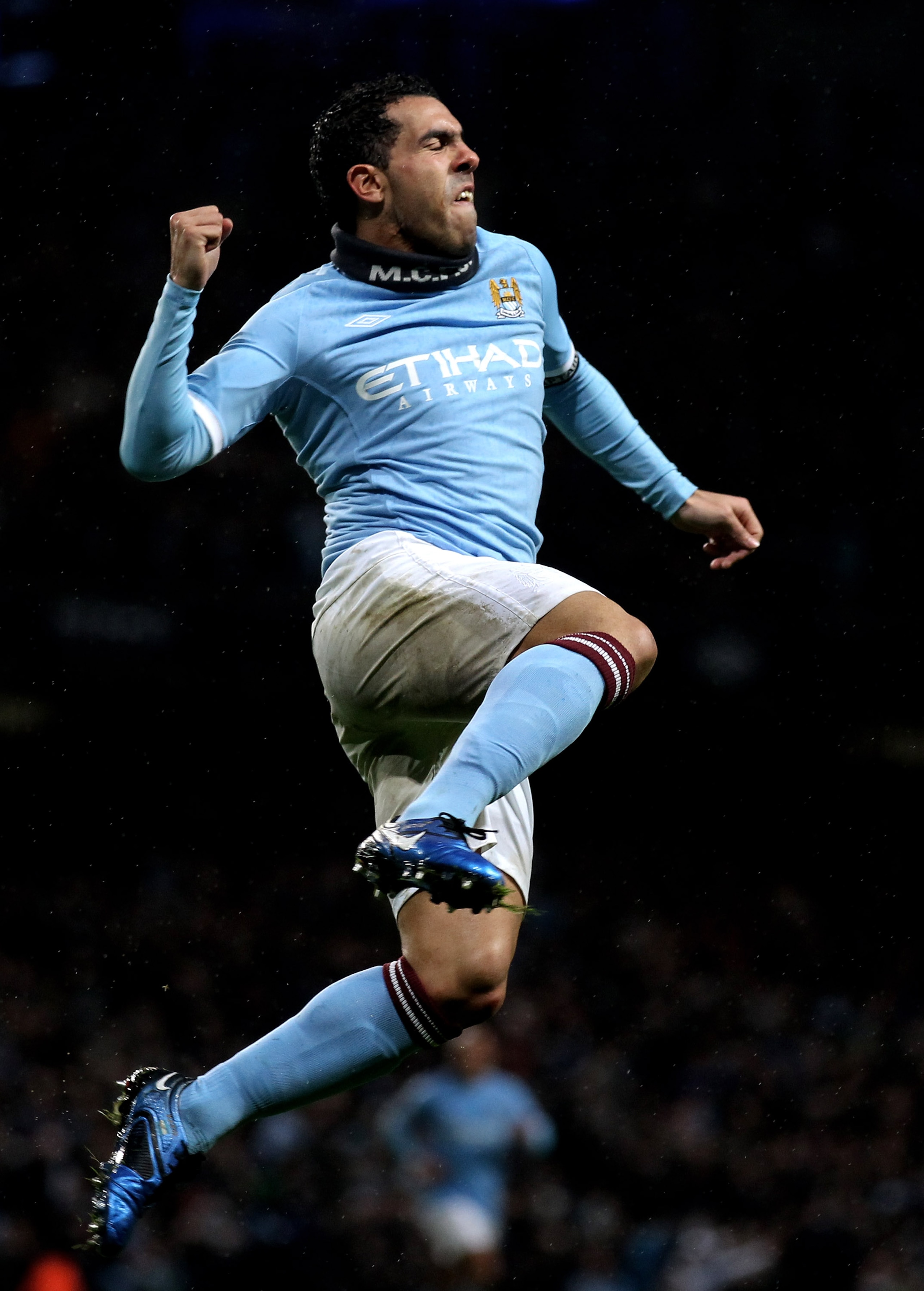 MANCHESTER, ENGLAND - JANUARY 15:  Carlos Tevez of Manchester City celebrates scoring his team's second goal during the Barclays Premier League match between Manchester City and Wolverhampton Wanderers at the City of Manchester Stadium on January 15, 2011