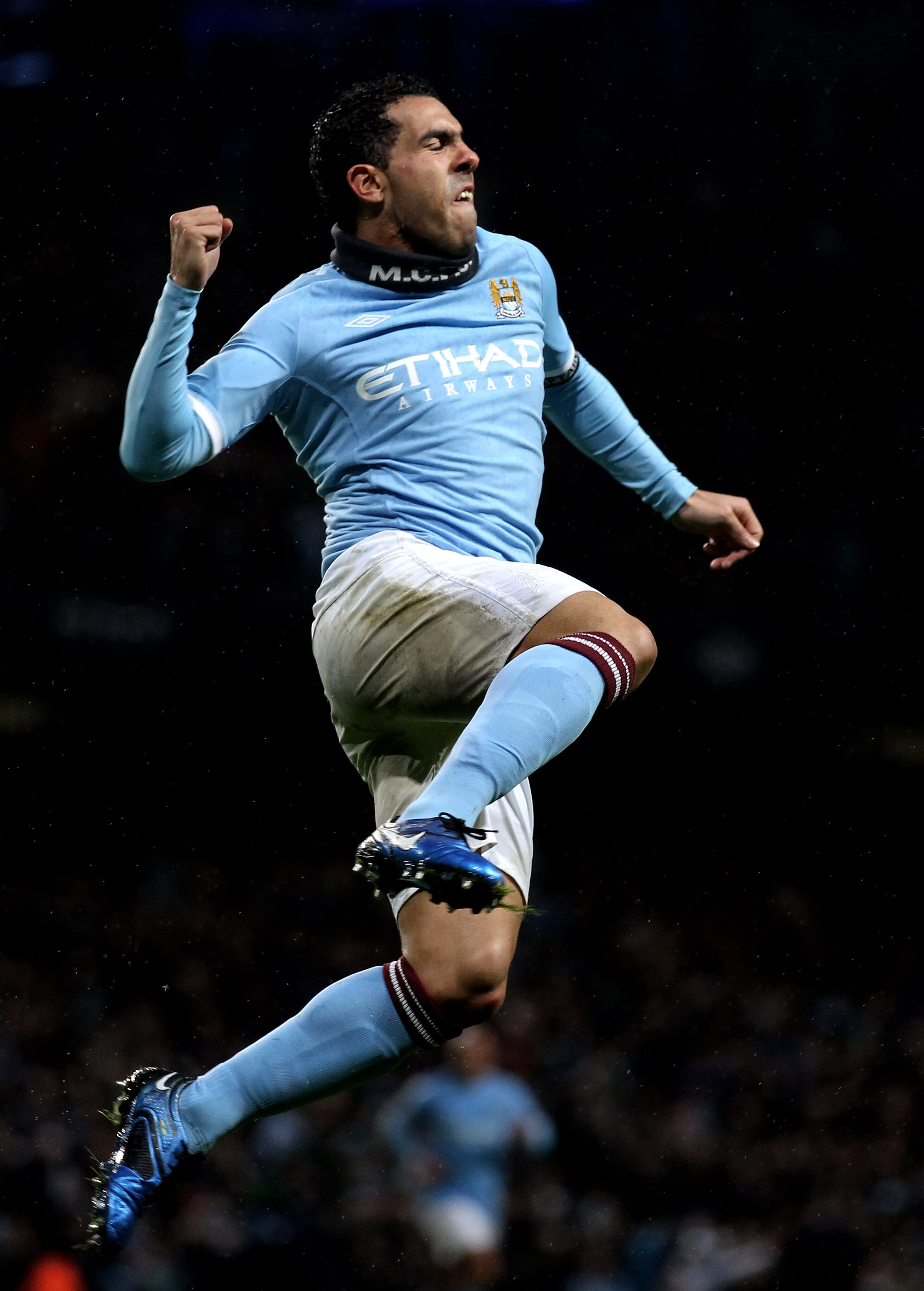 MANCHESTER, ENGLAND - JANUARY 15:  Carlos Tevez of Manchester City celebrates scoring his team's second goal during the Barclays Premier League match between Manchester City and Wolverhampton Wanderers at the City of Manchester Stadium on January 15, 2011